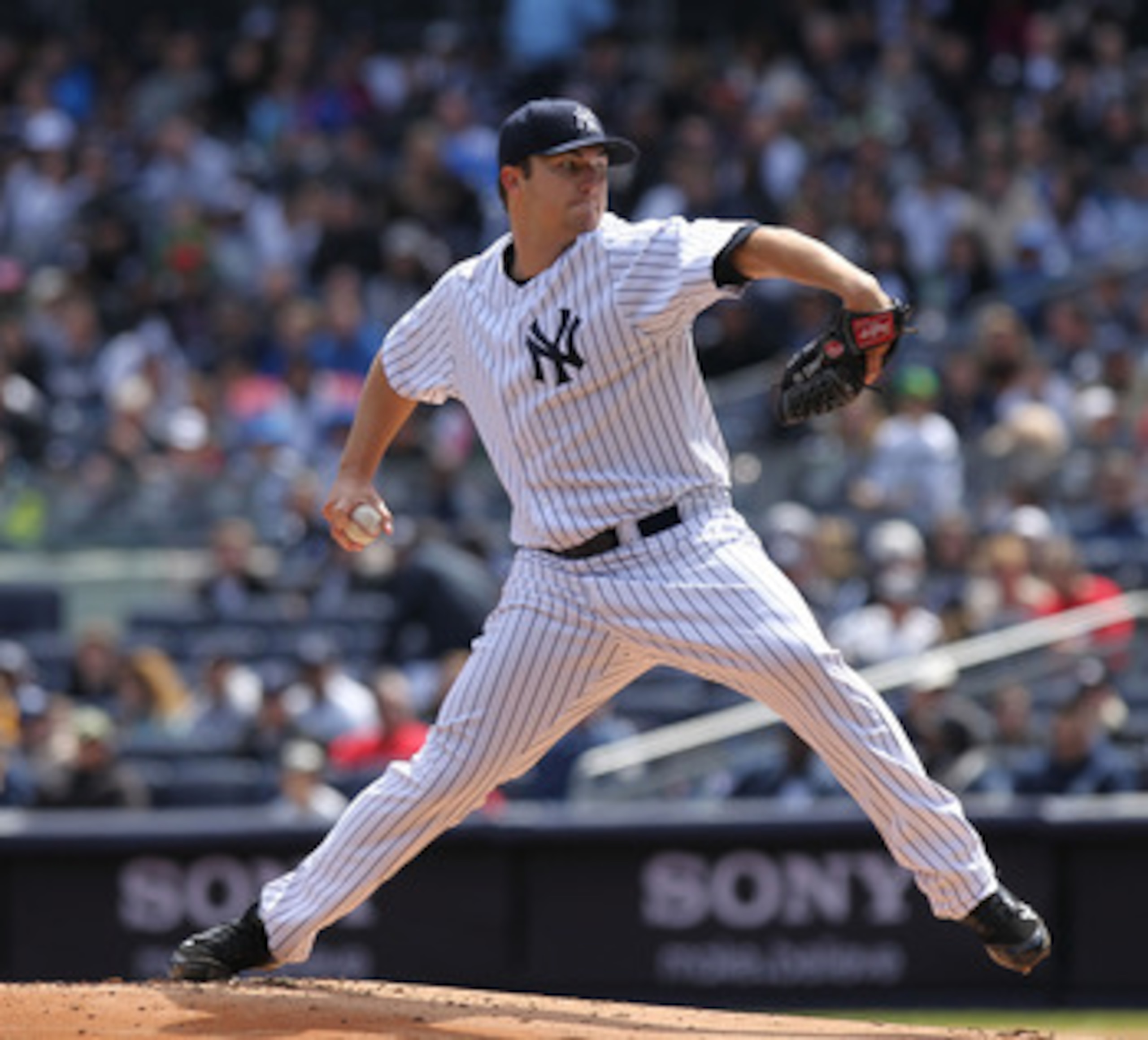 NEW YORK, NY - APRIL 03:  Phil Hughes #65 of the New York Yankees pitches against the Detroit Tigers at Yankee Stadium on April 3, 2011 in the Bronx borough of New York City.  (Photo by Nick Laham/Getty Images)
