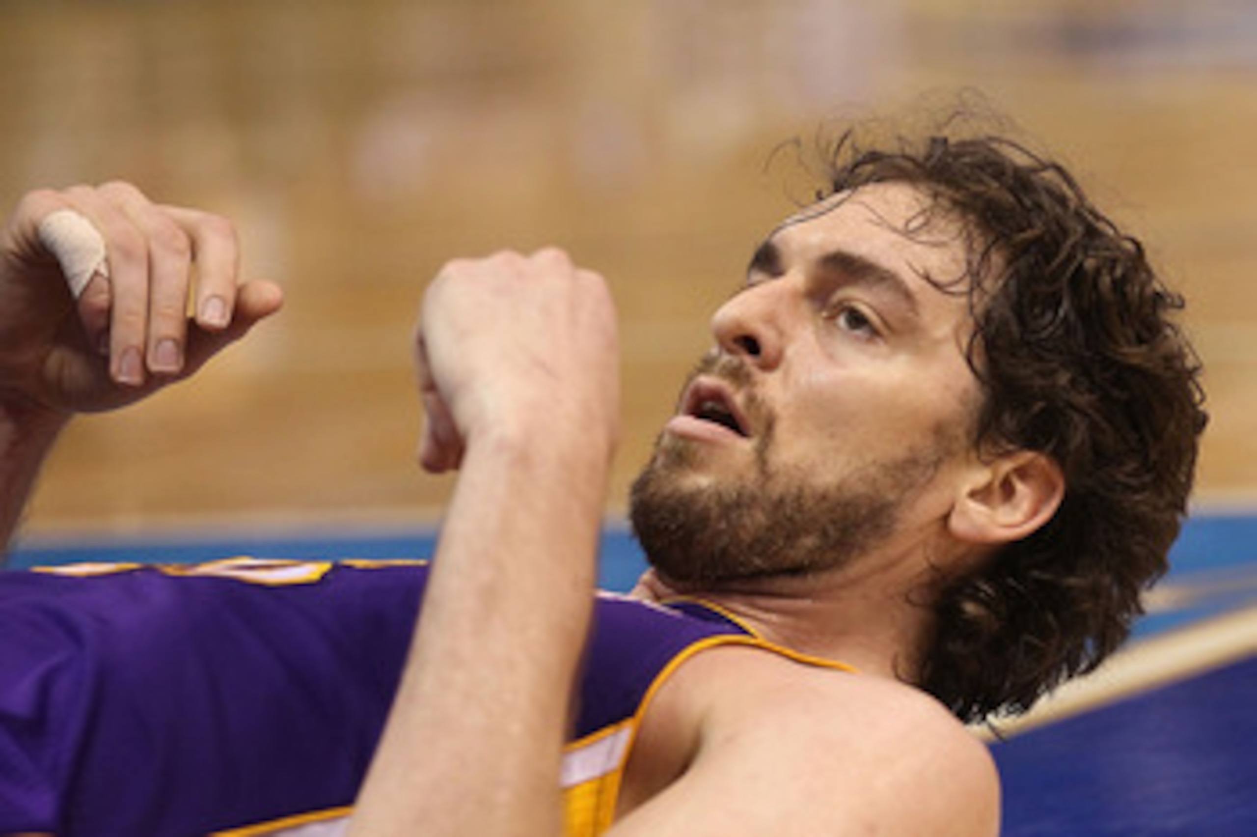 DALLAS, TX - MAY 08:  Forward Pau Gasol #16 of the Los Angeles Lakers on the ground after a foul by the Dallas Mavericks in Game Four of the Western Conference Semifinals during the 2011 NBA Playoffs on May 8, 2011 at American Airlines Center in Dallas, T