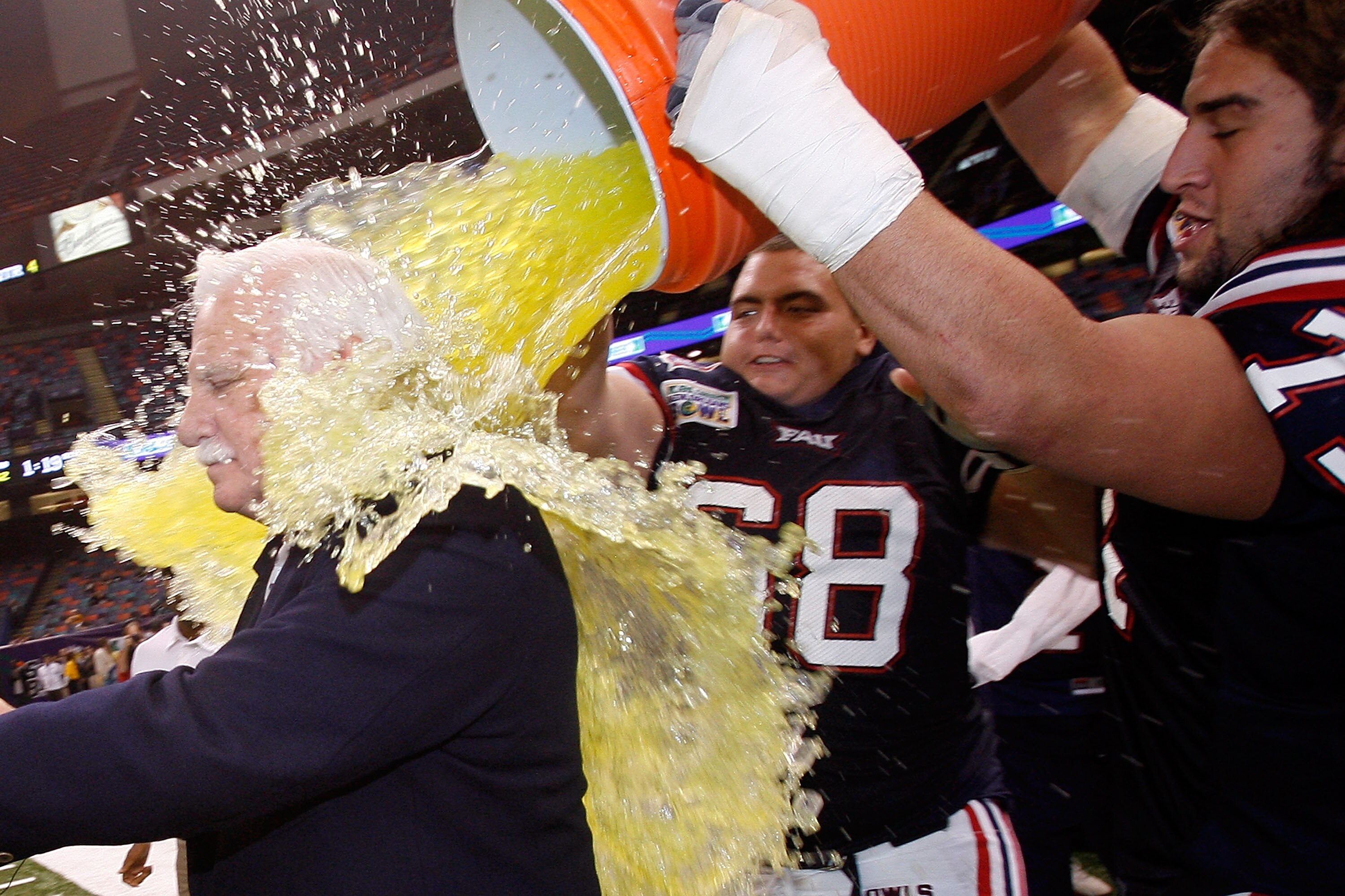 NEW ORLEANS - DECEMBER 21:  Head coach Howard Schnellenberger of the Florida Atlantic University Owls gets dunked with sports drink after defeating the Memphis University Tigers in the New Orleans Bowl on December 21, 2007 at the Louisiana Superdome in Ne