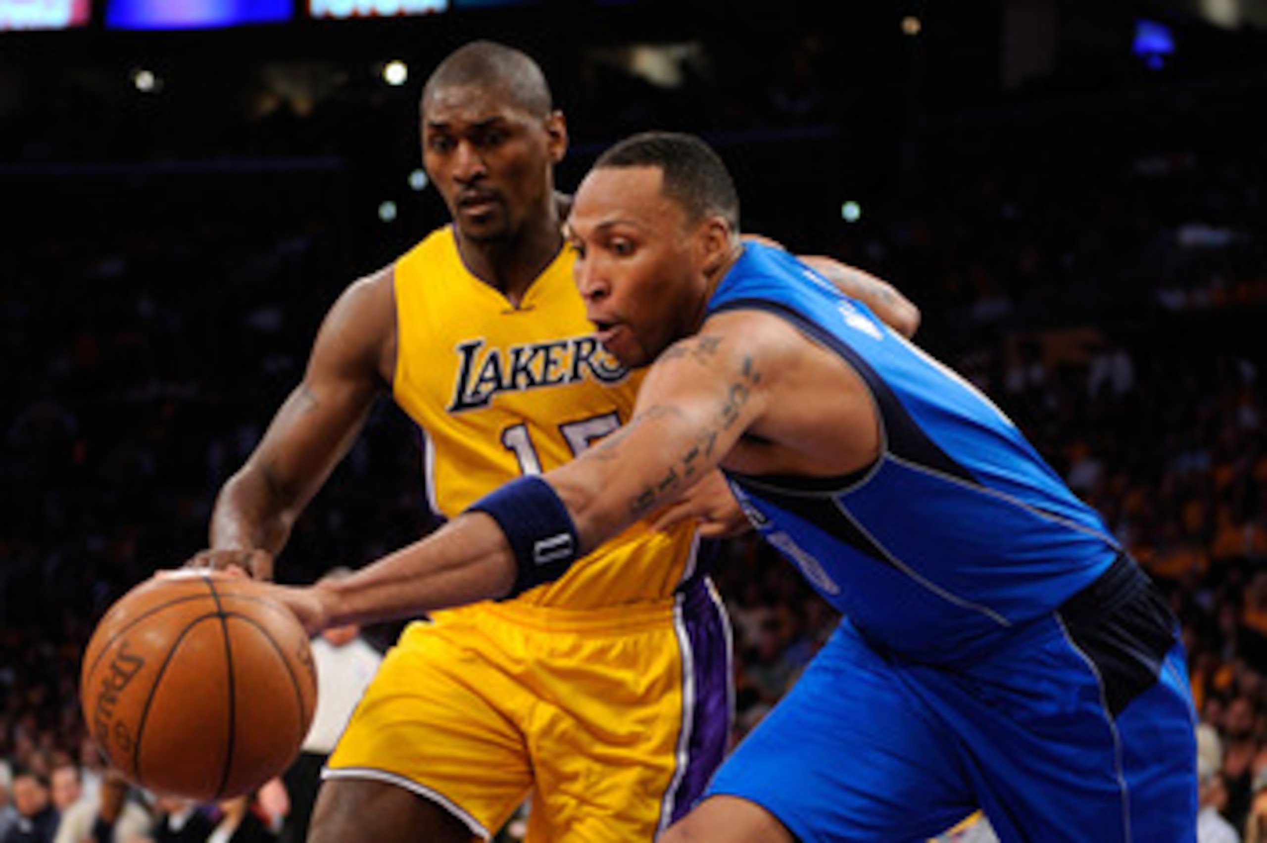 LOS ANGELES, CA - MAY 02:  Shawn Marion #0 of the Dallas Mavericks and Ron Artest #15 of the Los Angeles Lakers go after a loose ball in the second half in Game One of the Western Conference Semifinals in the 2011 NBA Playoffs at Staples Center on May 2, 