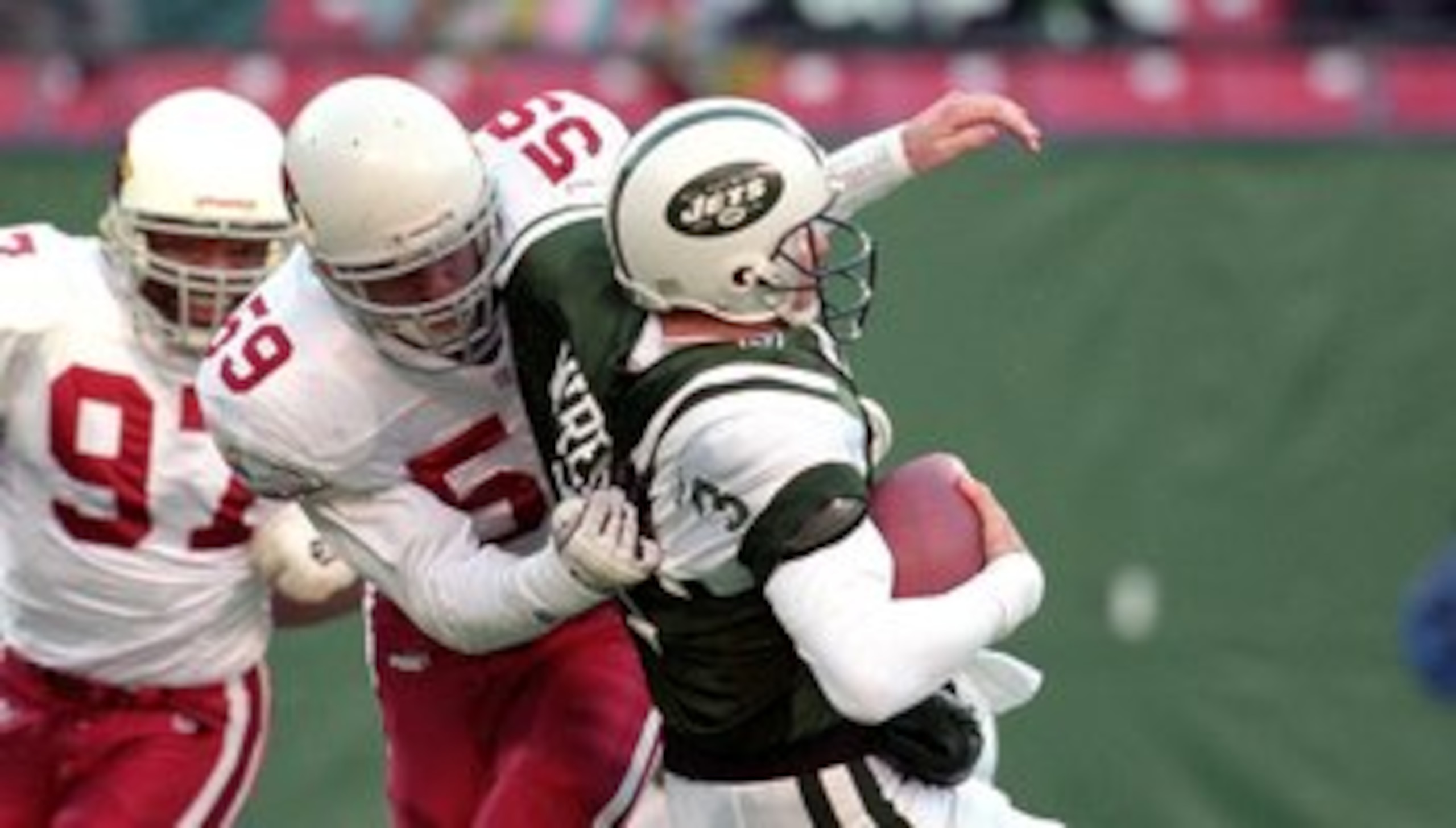 7 Nov 1999: Rob Fredrickson #59 of the Arizona Cardinals sacks Rick Mirer #3 of the New York Jets at Giants Stadium in East Rutherford, New Jersey. The Jets defeated the Cardinals 12-7.