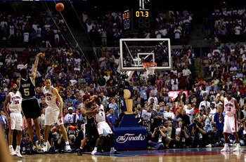 AUBURN HILLS, MI - JUNE 19:  Robert Horry #5 of the San Antonio Spurs makes a three-point shot to put the Spurs ahead of the Detroit Pistons 96-95 in the final seconds of overtime of Game five of the 2005 NBA Finals at The Palace of Auburn Hills on June 1