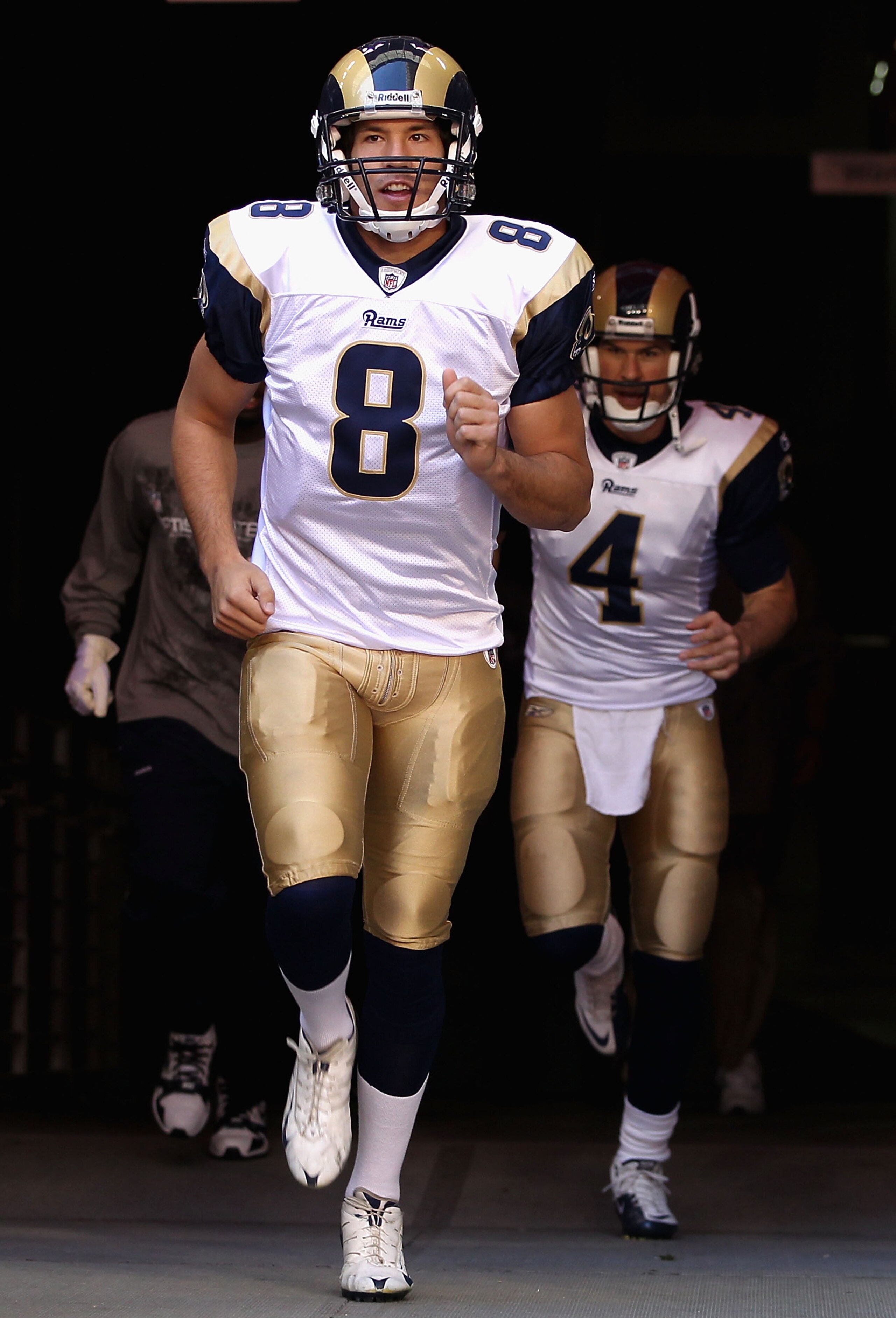 GLENDALE, AZ - DECEMBER 05: Quarterback Sam Bradford #8 of the St. Louis Rams runs out onto the field before the NFL game against the Arizona Cardinals at the University of Phoenix Stadium on December 5, 2010 in Glendale, Arizona. The Rams defeated the C GLENDALE, AZ - DECEMBER 05: Quarterback Sam Bradford #8 of the St. Louis Rams runs out onto the field before the NFL game against the Arizona Cardinals at the University of Phoenix Stadium on December 5, 2010 in Glendale, Arizona. The Rams defeated the C