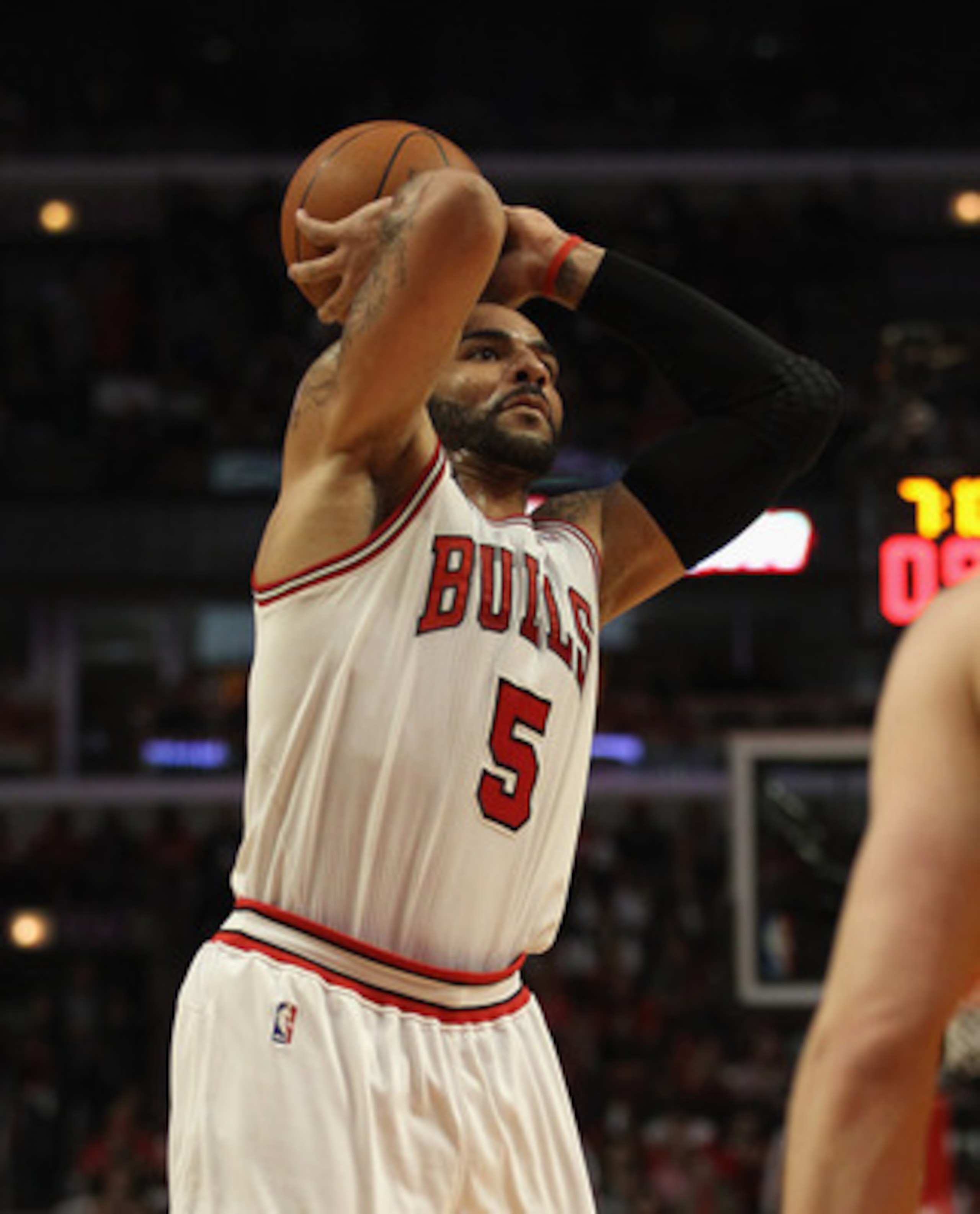 CHICAGO, IL - APRIL 26: Carlos Boozer #5 of the Chicago Bulls takes a shot against the Indiana Pacers in Game Five of the Eastern Conference Quarterfinals in the 2011 NBA Playoffs at the United Center on April 26, 2011 in Chicago, Illinois. The Bulls defe