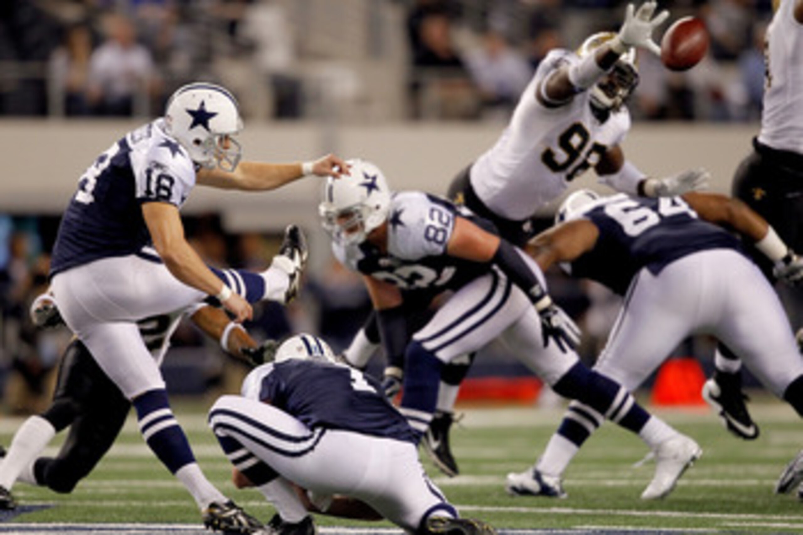 ARLINGTON, TX - NOVEMBER 25:  Kicker David Buehler #18 of the Dallas Cowboys at Cowboys attempts a field goal to tie the game in the final seconds of the fourth quarter against the New Orleans Saints at Cowboys Stadium on November 25, 2010 in Arlington, T