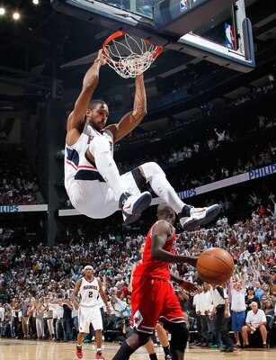 ATLANTA, GA - MAY 08:  Al Horford #15 of the Atlanta Hawks dunks against Luol Deng #9 of the Chicago Bulls in Game Four of the Eastern Conference Semifinals in the 2011 NBA Playoffs at Phillips Arena on May 8, 2011 in Atlanta, Georgia.  NOTE TO USER: User