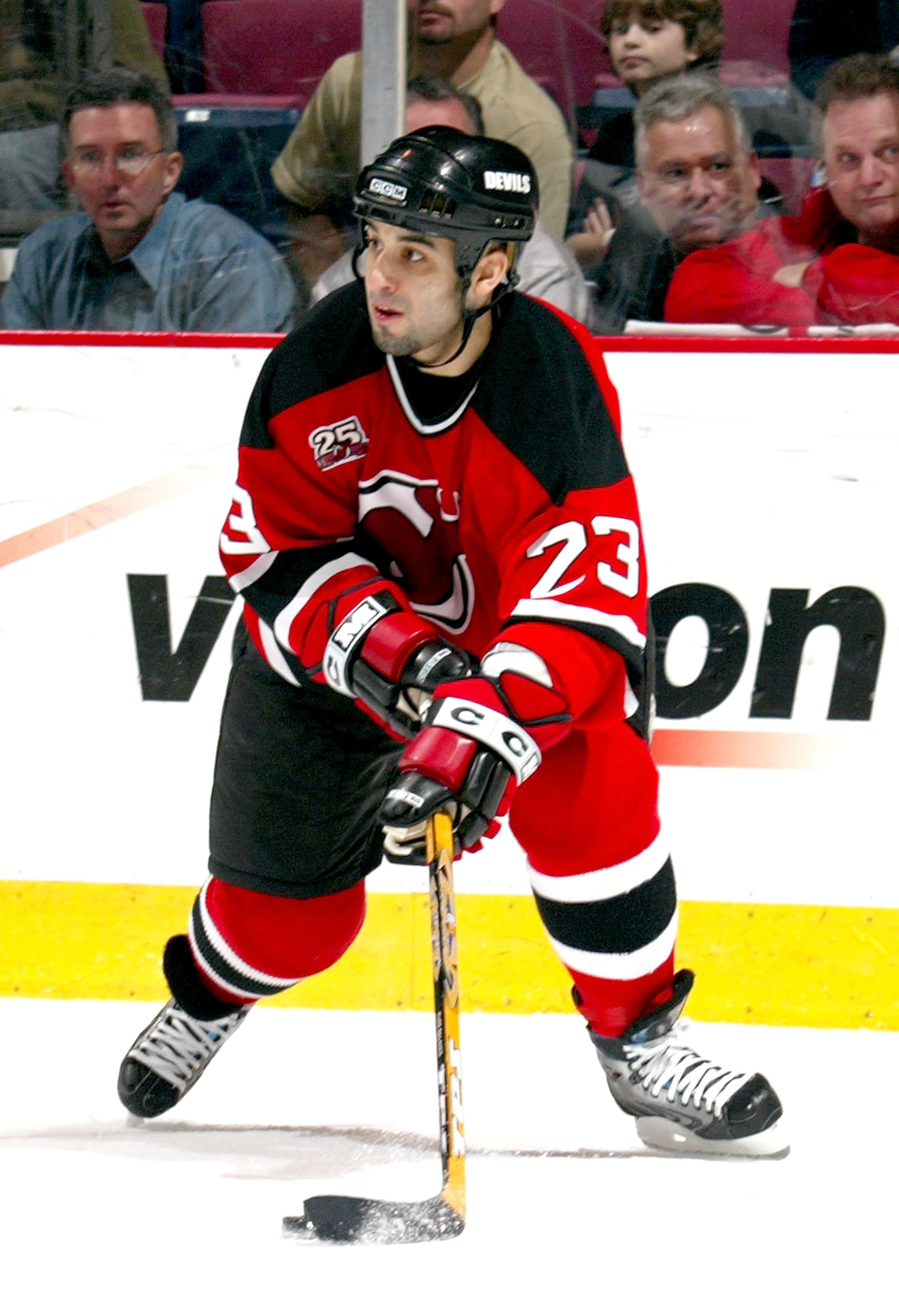 EAST RUTHERFORD, NJ - APRIL 20:  Scott Gomez #23 of the New Jersey Devils skates with the puck during Game 5 of the 2007 Eastern Conference Quarterfinals against Tampa Bay Lightning on April 20, 2007 at Continental Airlines Arena in East Rutherford, New J