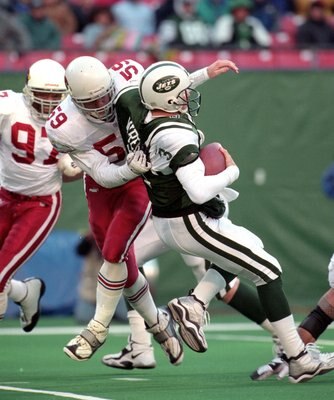 7 Nov 1999: Rob Fredrickson #59 of the Arizona Cardinals sacks Rick Mirer #3 of the New York Jets at Giants Stadium in East Rutherford, New Jersey. The Jets defeated the Cardinals 12-7.