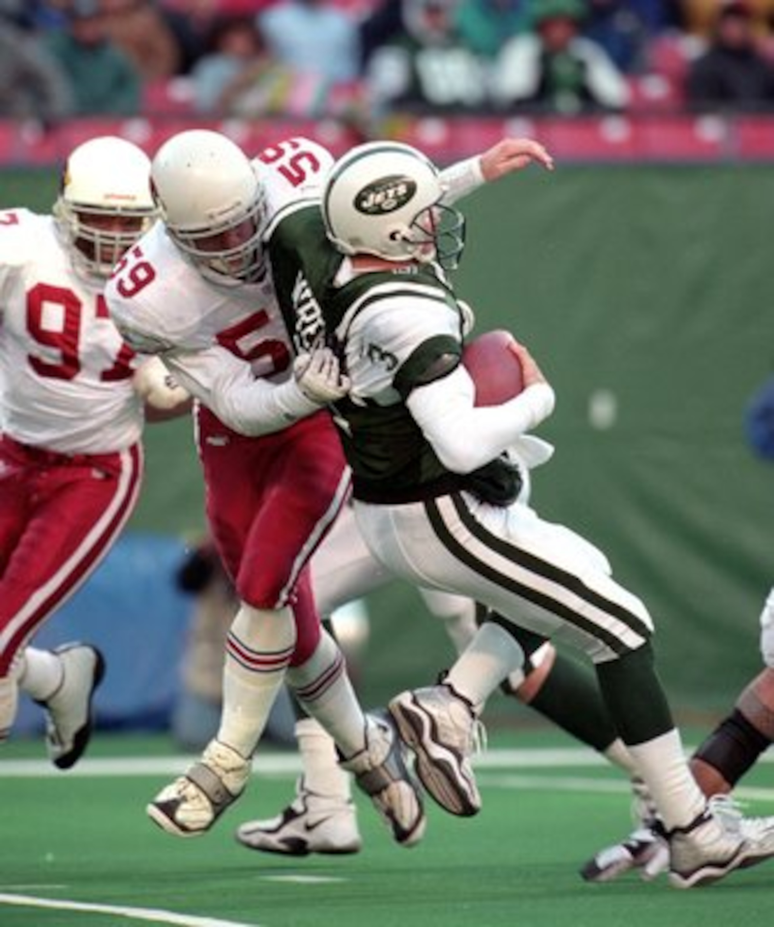 7 Nov 1999: Rob Fredrickson #59 of the Arizona Cardinals sacks Rick Mirer #3 of the New York Jets at Giants Stadium in East Rutherford, New Jersey. The Jets defeated the Cardinals 12-7.