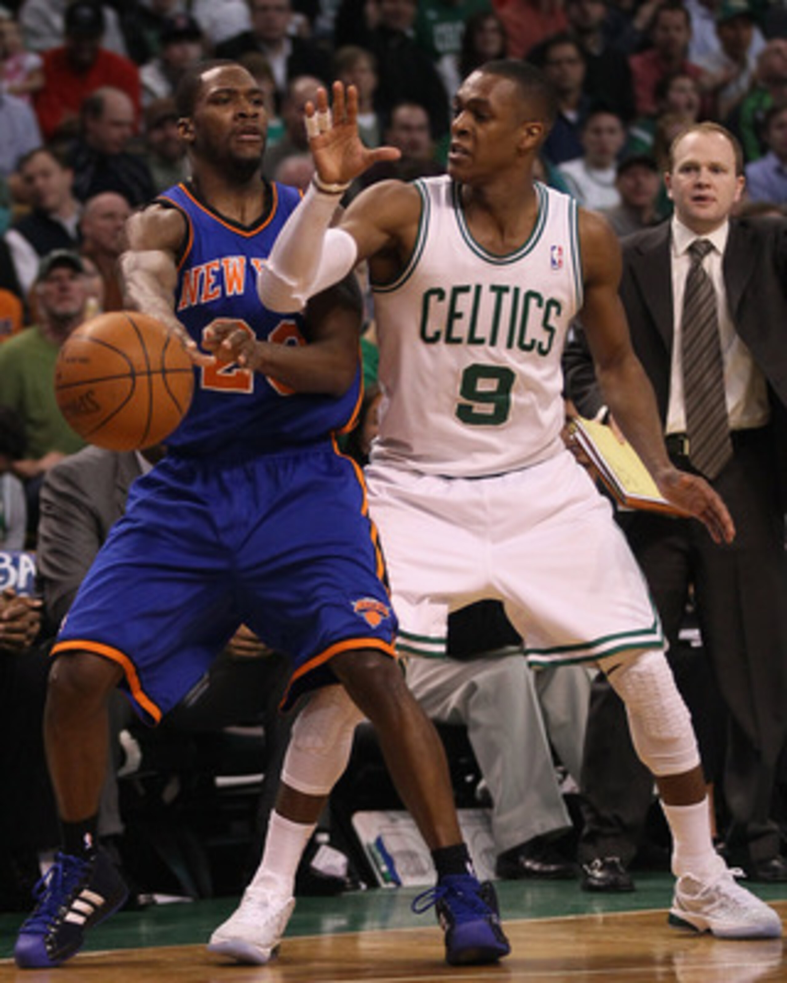 BOSTON, MA - APRIL 19:  Toney Douglas #23 of the New York Knicks tries to pass as Rajon Rondo #9 of the Boston Celtics defends in Game Two of the Eastern Conference Quarterfinals in the 2011 NBA Playoffs on April 19, 2011 at the TD Garden in Boston, Massa