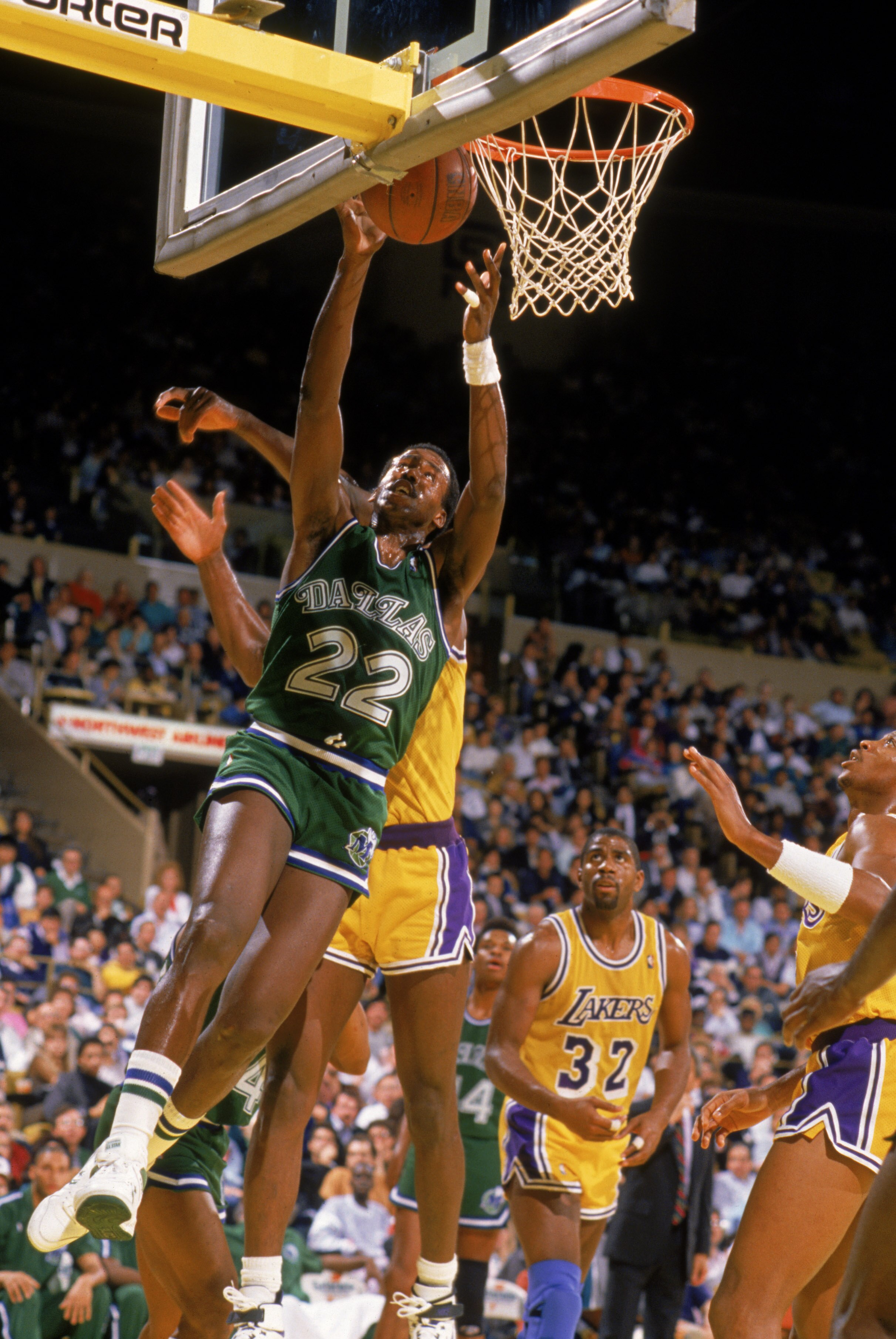 LOS ANGELES - 1988:  Rolando Blackman #22 of the Dallas Mavericks grabs a rebound during the NBA game against the Los Angeles Lakers at the Great Western Forum in Los Angeles, California in 1988. NOTE TO USER: User expressly acknowledges and agrees that,