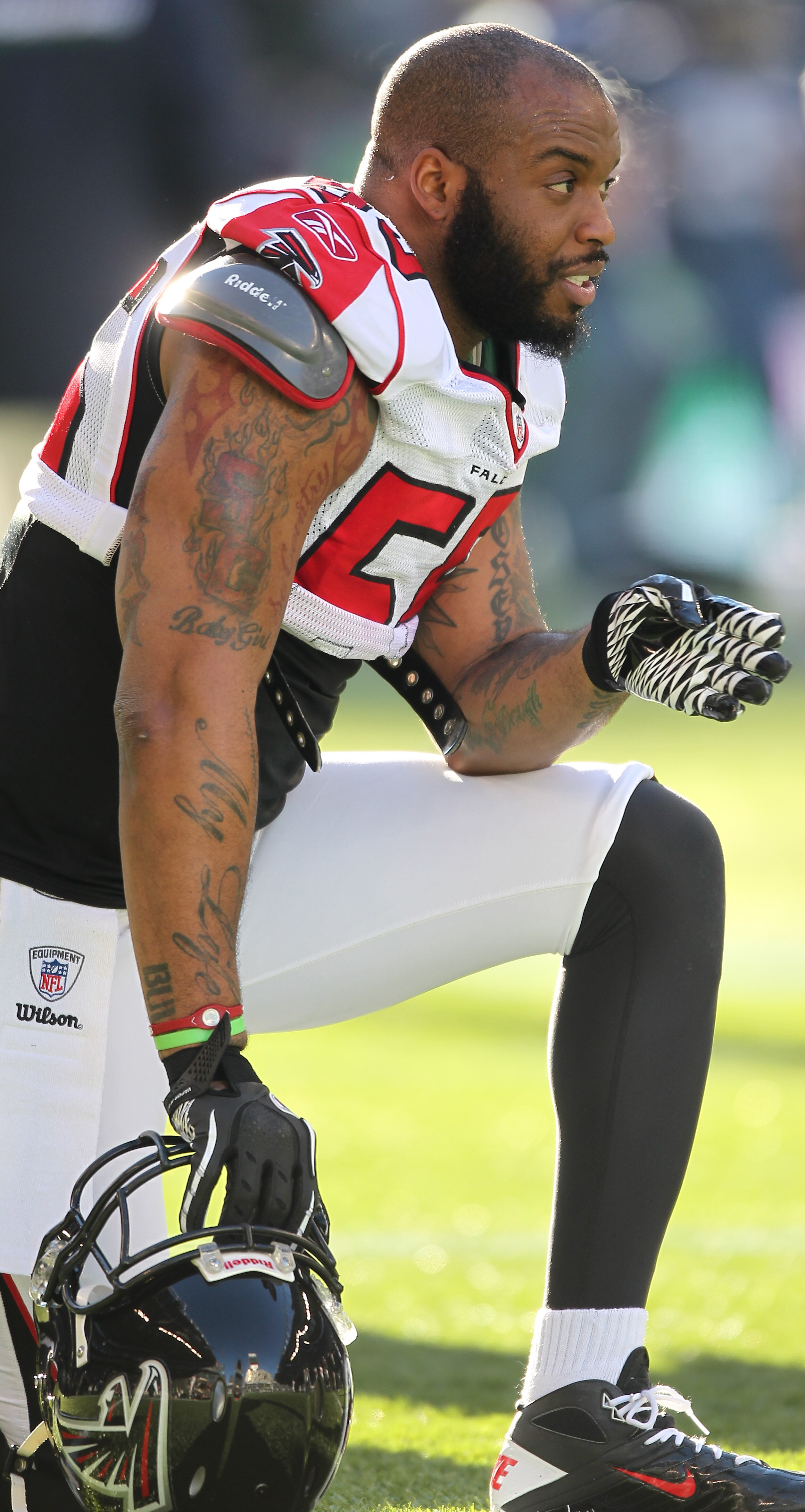 SEATTLE, WA - DECEMBER 19:  Defensive end John Abraham #55 of the Atlanta Falcons looks on during warmups prior to the game against the Seattle Seahawks at Qwest Field on December 19, 2010 in Seattle, Washington. (Photo by Otto Greule Jr/Getty Images)
