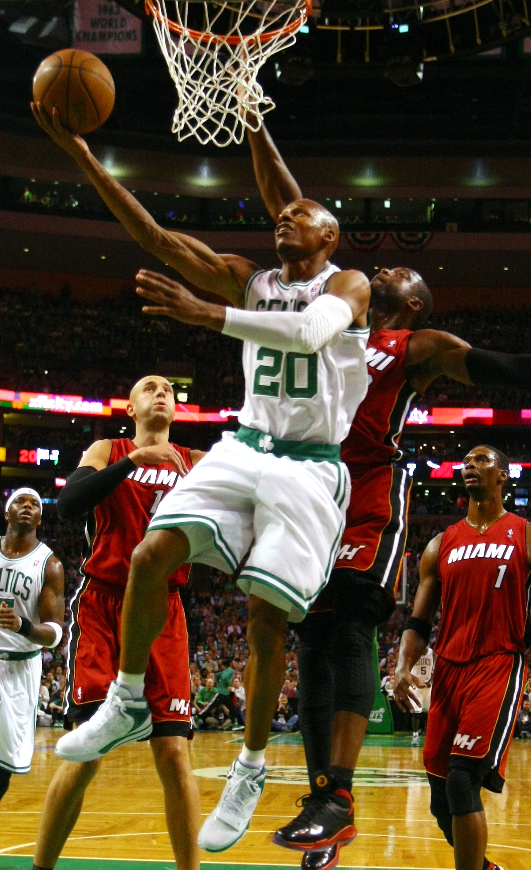 BOSTON, MA - MAY 07: Ray Allen #20 of the Boston Celtics takes a shot as Dwyane Wade #3 of the Miami Heat defends in Game Three of the Eastern Conference Semifinals in the 2011 NBA Playoffs on May 7, 2011 at the TD Garden in Boston, Massachusetts.  NOTE T
