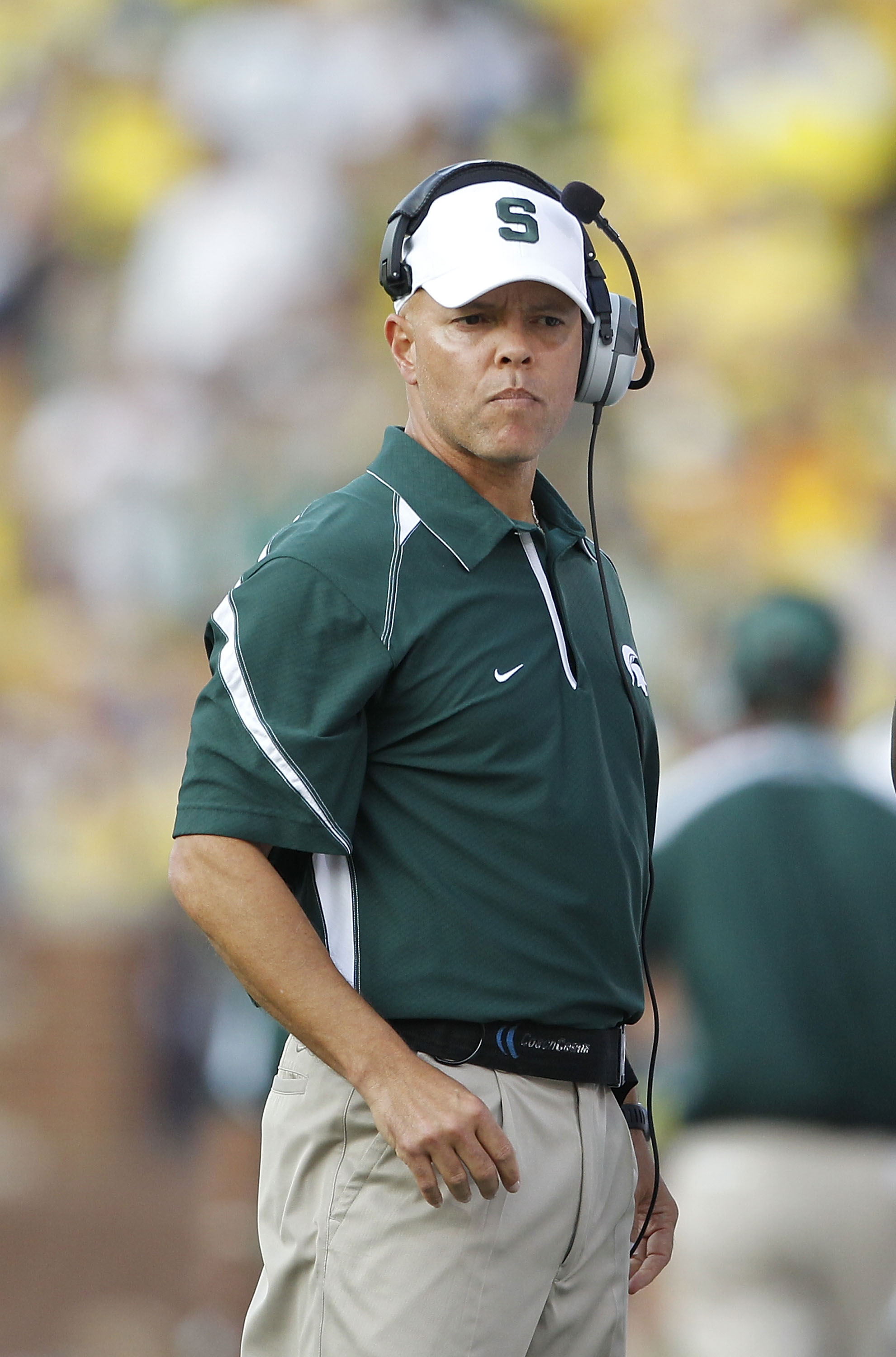 ANN ARBOR, MI - OCTOBER 09: Michigan State Spartans offensive coordinator Don Treadwell watches the action during the  game against the Michigan Wolverines on October 9, 2010 at Michigan Stadium in Ann Arbor, Michigan. The Michigan Spartans defeated the M