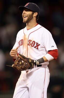 BOSTON, MA - MAY 02:  Dustin Pedroia #15 of the Boston Red Sox celebrates the win over the Los Angeles Angels on May 2, 2011 at Fenway Park in Boston, Massachusetts. The Boston Red Sox defeated the Los Angeles Angels 9-5.  (Photo by Elsa/Getty Images)