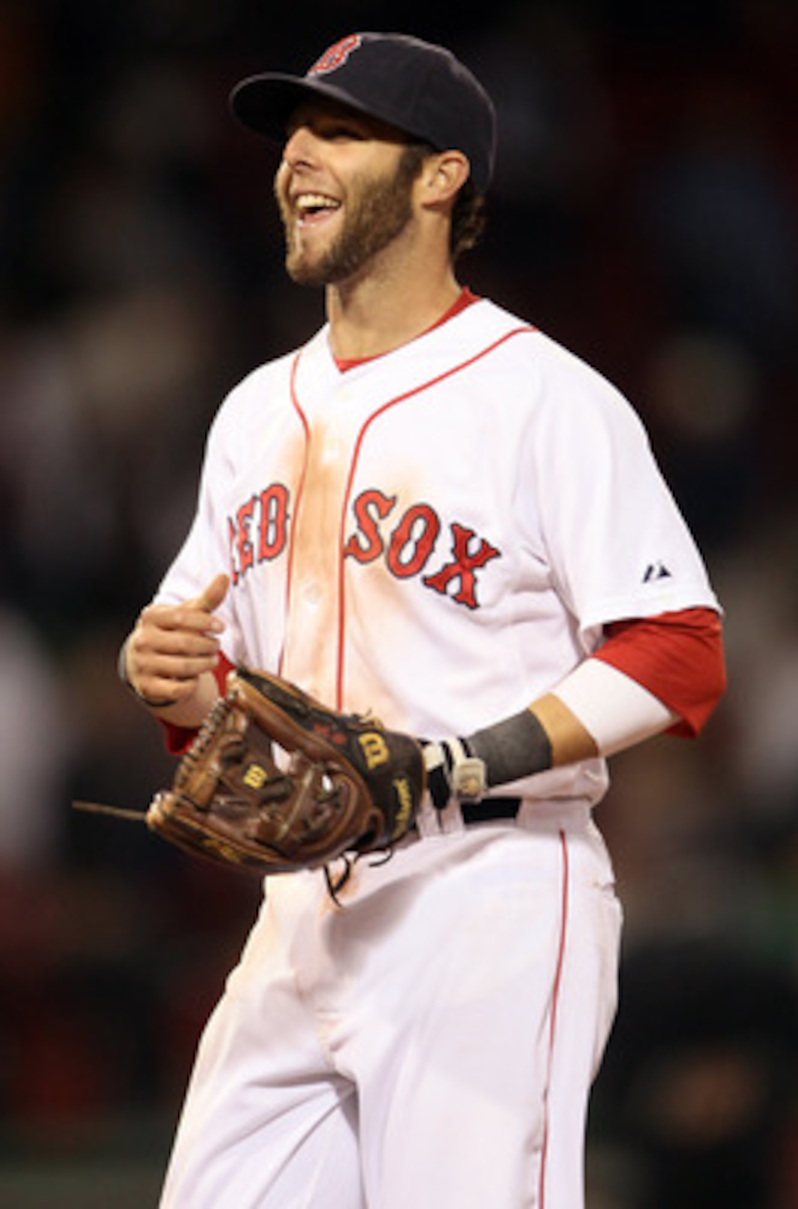BOSTON, MA - MAY 02: Dustin Pedroia #15 of the Boston Red Sox celebrates the win over the Los Angeles Angels on May 2, 2011 at Fenway Park in Boston, Massachusetts. The Boston Red Sox defeated the Los Angeles Angels 9-5. (Photo by Elsa/Getty Images) BOSTON, MA - MAY 02: Dustin Pedroia #15 of the Boston Red Sox celebrates the win over the Los Angeles Angels on May 2, 2011 at Fenway Park in Boston, Massachusetts. The Boston Red Sox defeated the Los Angeles Angels 9-5. (Photo by Elsa/Getty Images)