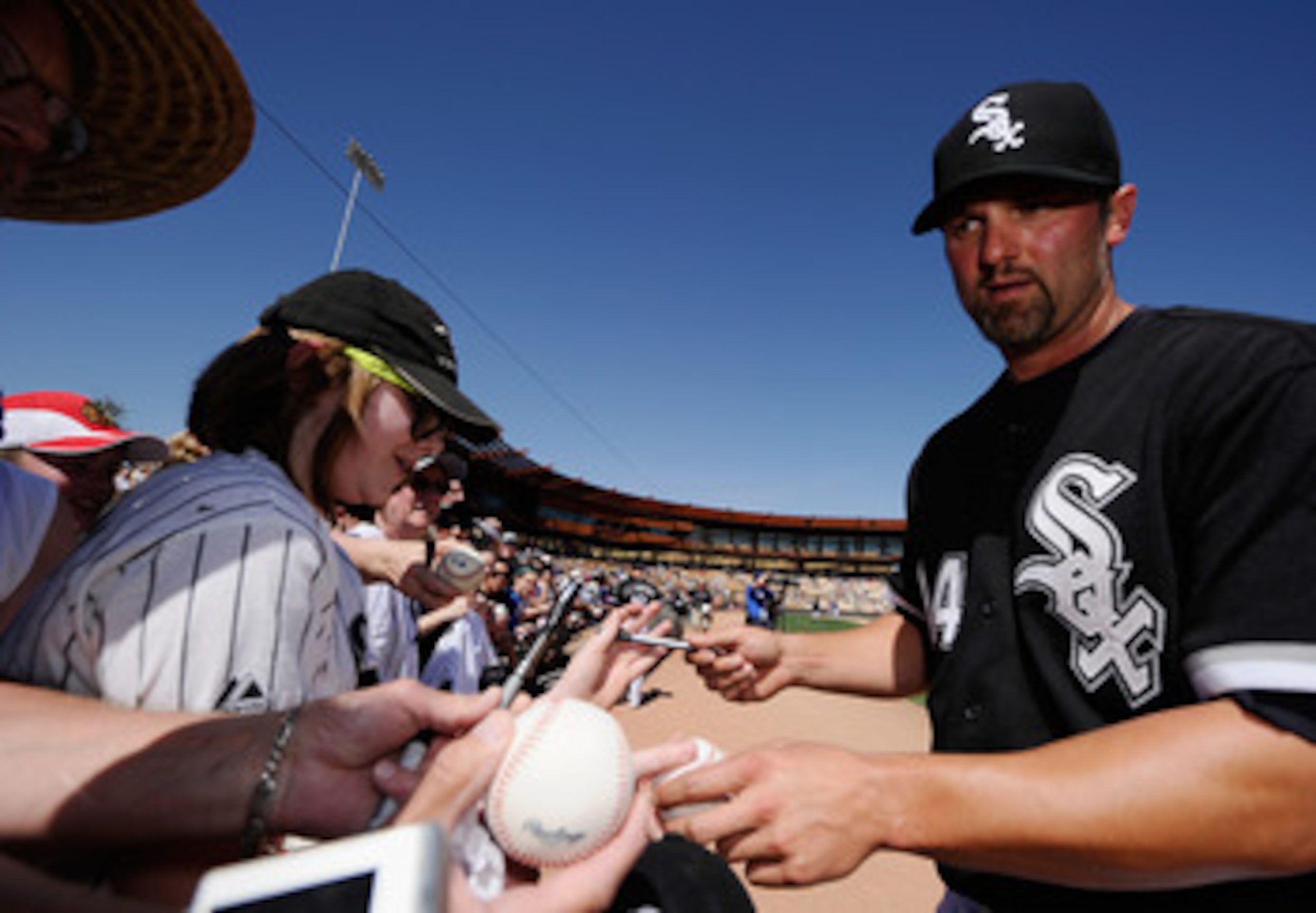 GLENDALE, AZ - MARCH 11: Paul Konerko #14 of the Chicago White Sox signs baseballs prior to the start of the spring training baseball game against Chicago Cubs at Camelback Ranch on March 11, 2011 in Glendale, Arizona. (Photo by Kevork Djansezian/Getty GLENDALE, AZ - MARCH 11: Paul Konerko #14 of the Chicago White Sox signs baseballs prior to the start of the spring training baseball game against Chicago Cubs at Camelback Ranch on March 11, 2011 in Glendale, Arizona. (Photo by Kevork Djansezian/Getty