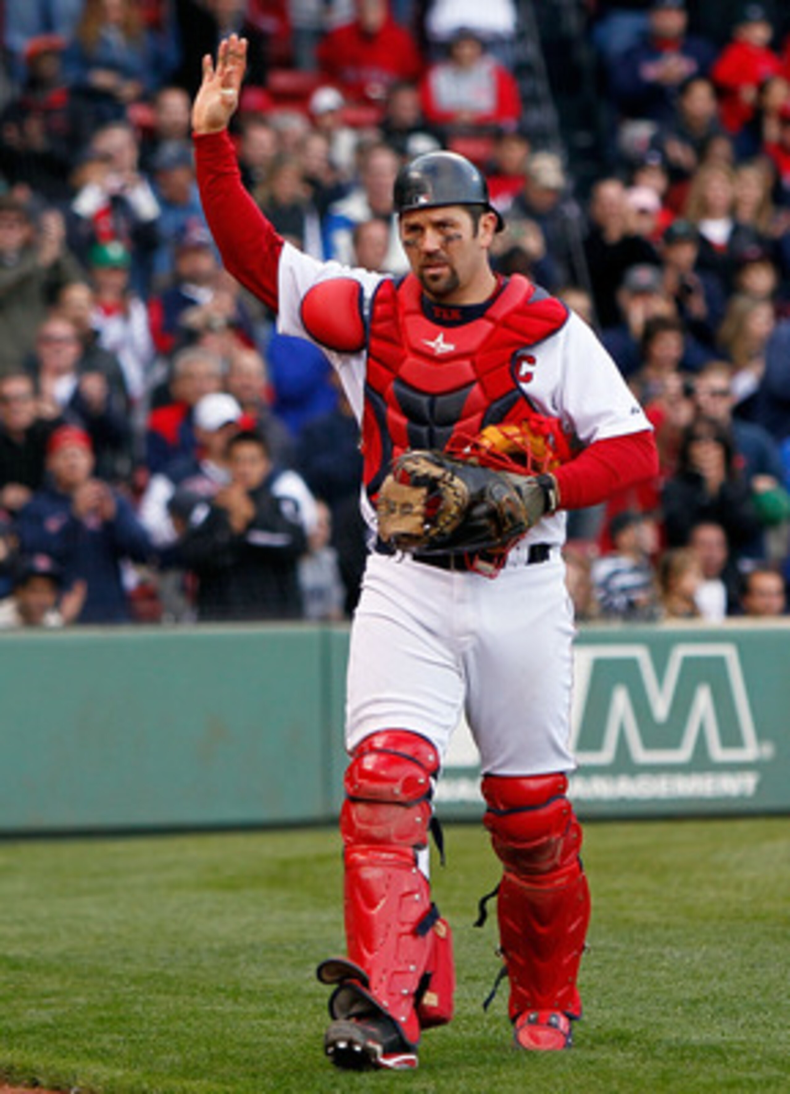 BOSTON - OCTOBER 3: Jason Varitek #33 of the Boston Red Sox reacts to fan applause as he leaves the field for a replacement in the ninth inning against the New York Yankees at Fenway Park, October 3, 2010, in Boston, Massachusetts. The Red Sox won 8-4. BOSTON - OCTOBER 3: Jason Varitek #33 of the Boston Red Sox reacts to fan applause as he leaves the field for a replacement in the ninth inning against the New York Yankees at Fenway Park, October 3, 2010, in Boston, Massachusetts. The Red Sox won 8-4.