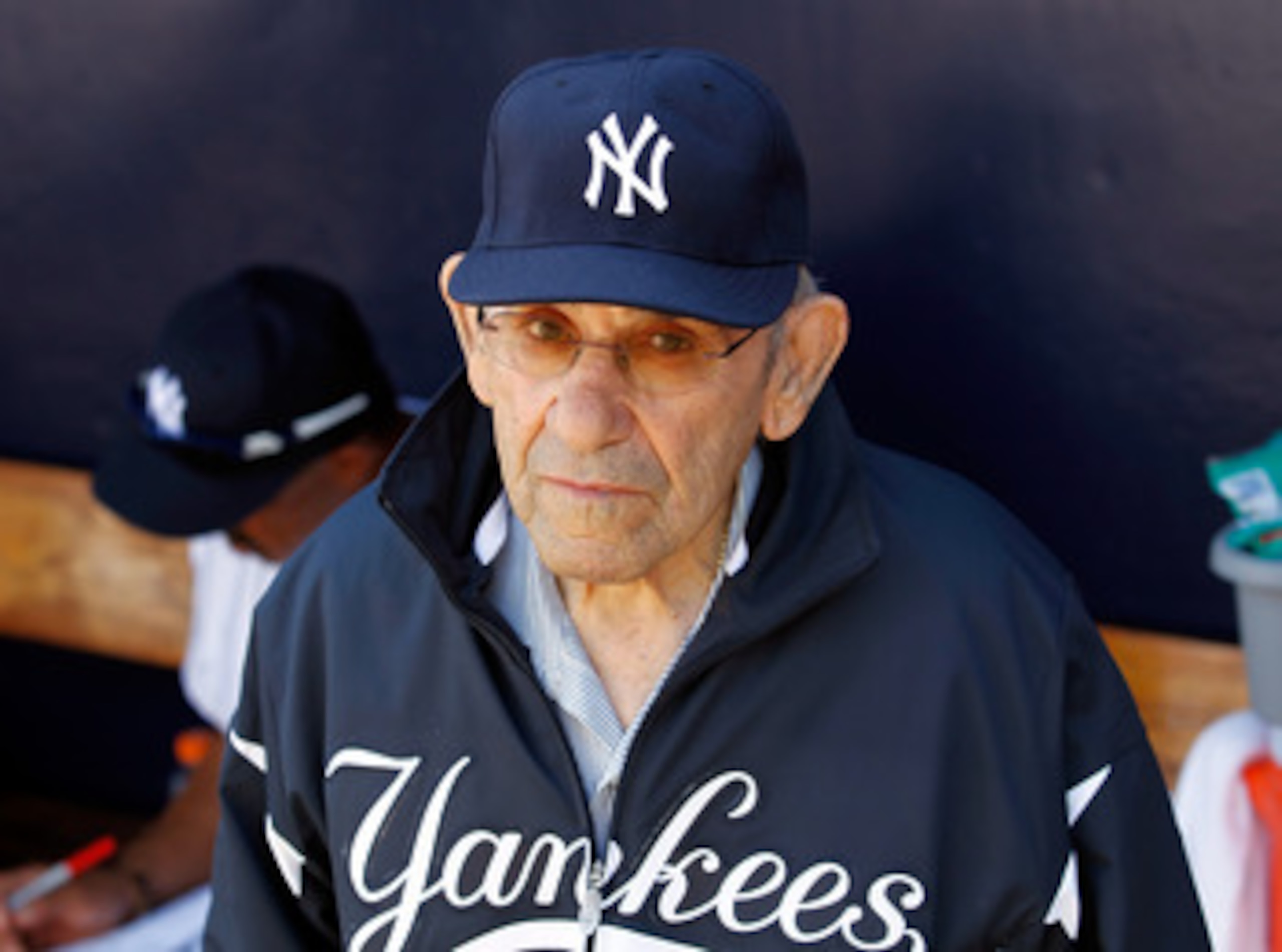 TAMPA, FL - FEBRUARY 26: Hall of Famer Yogi Berra of the New York Yankees stands in the dugout just prior to the start of the Grapefruit League Spring Training Game against the Philadelphia Phillies at George M. Steinbrenner Field on February 26, 2011 in TAMPA, FL - FEBRUARY 26: Hall of Famer Yogi Berra of the New York Yankees stands in the dugout just prior to the start of the Grapefruit League Spring Training Game against the Philadelphia Phillies at George M. Steinbrenner Field on February 26, 2011 in