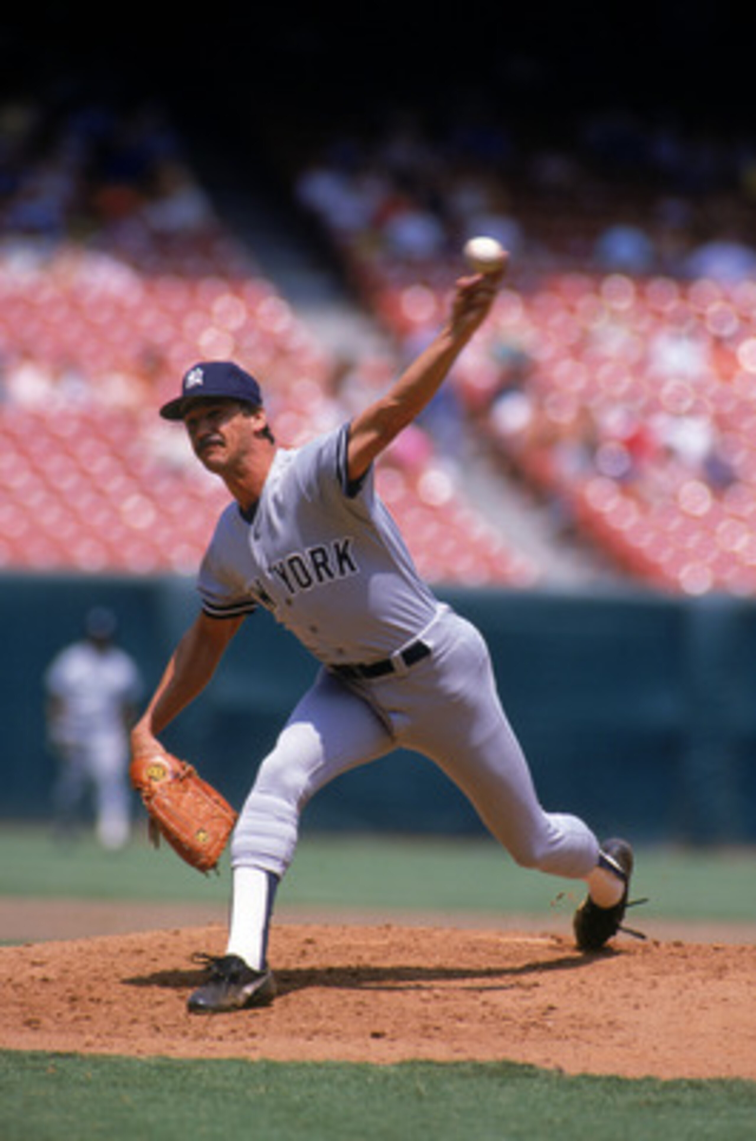 ANAHEIM, CA - 1987: Ron Guidry #49 of the New York Yankees pitches during a game in the 1987 season against the California Angels at Anaheim Stadium in Anaheim, California. (Photo by Tim DeFrisco/Getty Images) ANAHEIM, CA - 1987: Ron Guidry #49 of the New York Yankees pitches during a game in the 1987 season against the California Angels at Anaheim Stadium in Anaheim, California. (Photo by Tim DeFrisco/Getty Images)