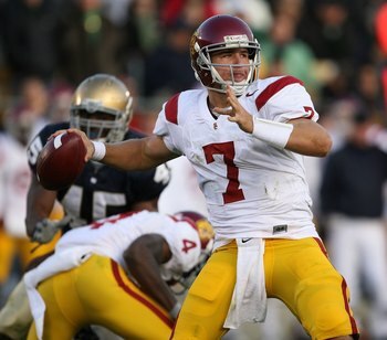 SOUTH BEND, IN - OCTOBER 17: Matt Barkley #7 of the USC Trojans at Notre Dame Stadium looks for a receiver against the Notre Dame Fighting Irish on October 17, 2009 in South Bend, Indiana. USC defeated Notre Dame 34-27. (Photo by Jonathan Daniel/Getty Ima