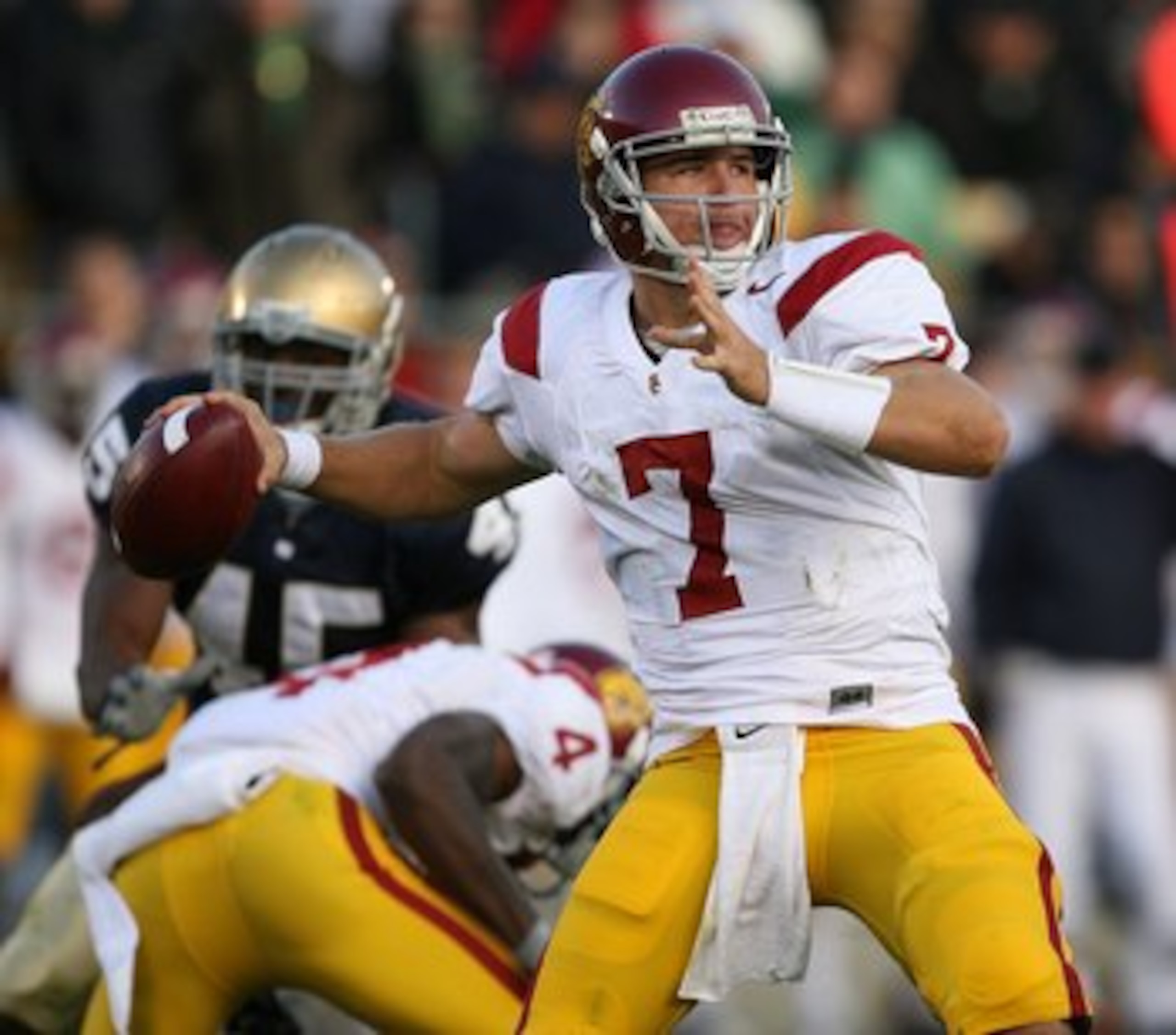 SOUTH BEND, IN - OCTOBER 17: Matt Barkley #7 of the USC Trojans at Notre Dame Stadium looks for a receiver against the Notre Dame Fighting Irish on October 17, 2009 in South Bend, Indiana. USC defeated Notre Dame 34-27. (Photo by Jonathan Daniel/Getty Ima