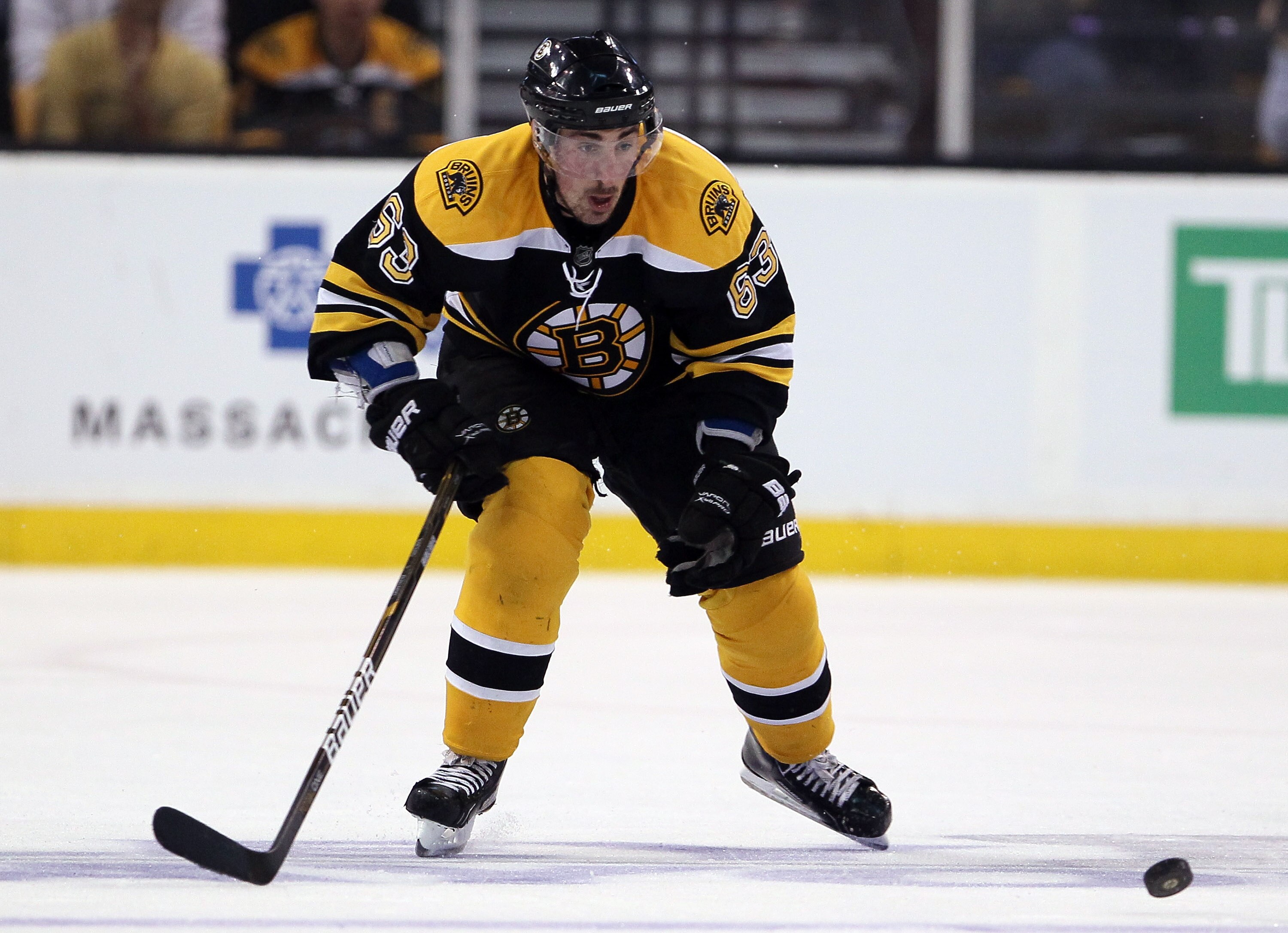 BOSTON, MA - MAY 06:  Brad Marchand #63 of the Boston Bruins takes the puck in the third period against the Philadelphia Flyers in Game Four of the Eastern Conference Semifinals during the 2011 NHL Stanley Cup Playoffs at TD Garden on May 6, 2011 in Bosto