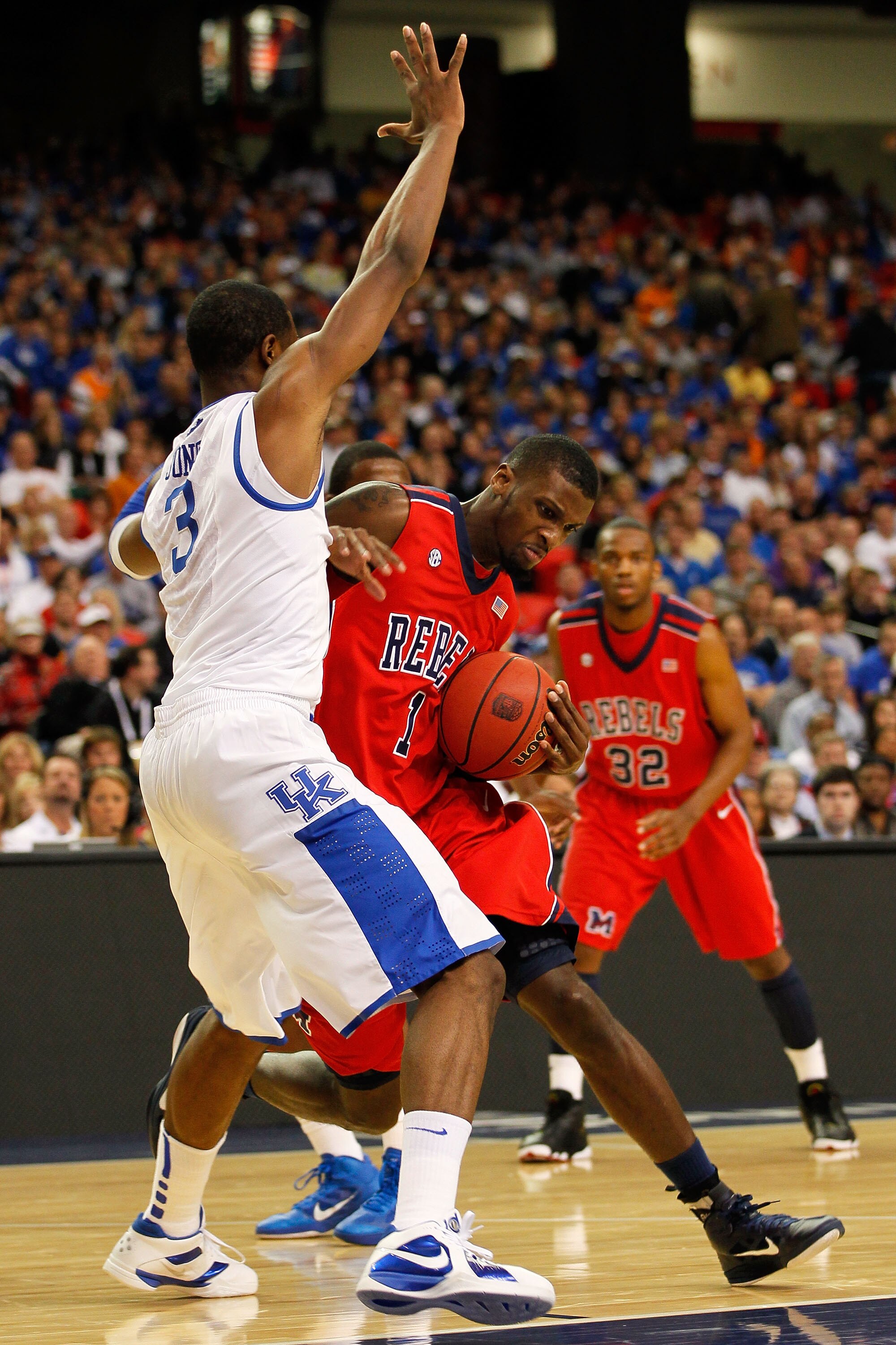 ATLANTA, GA - MARCH 11:  Terrance Henry #1 of the Ole Miss Rebels drives against Terrence Jones #3 of the Kentucky Wildcats during the quarterfinals of the SEC Men's Basketball Tournament at Georgia Dome on March 11, 2011 in Atlanta, Georgia.  (Photo by K