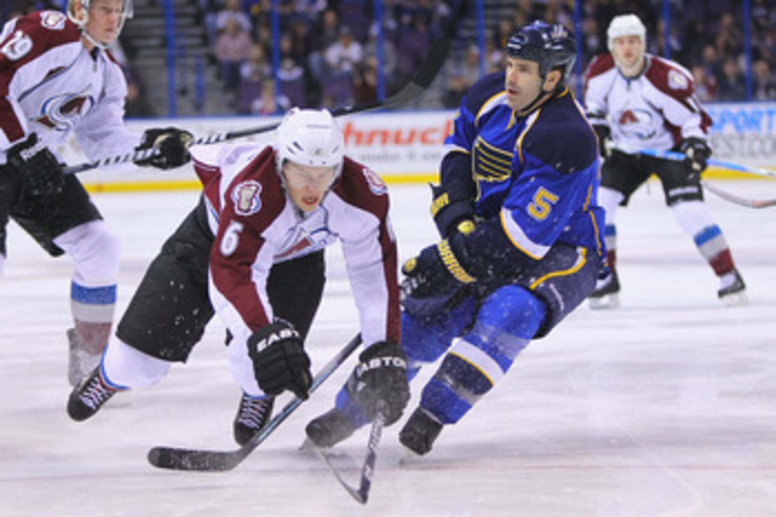 ST. LOUIS, MO - APRIL 5: Erik Johnson #6 of the Colorado Avalanche trips over the stick of Barret Jackman #5 of the St. Louis Blues  at the Scottrade Center on April 5, 2011 in St. Louis, Missouri.  (Photo by Dilip Vishwanat/Getty Images)