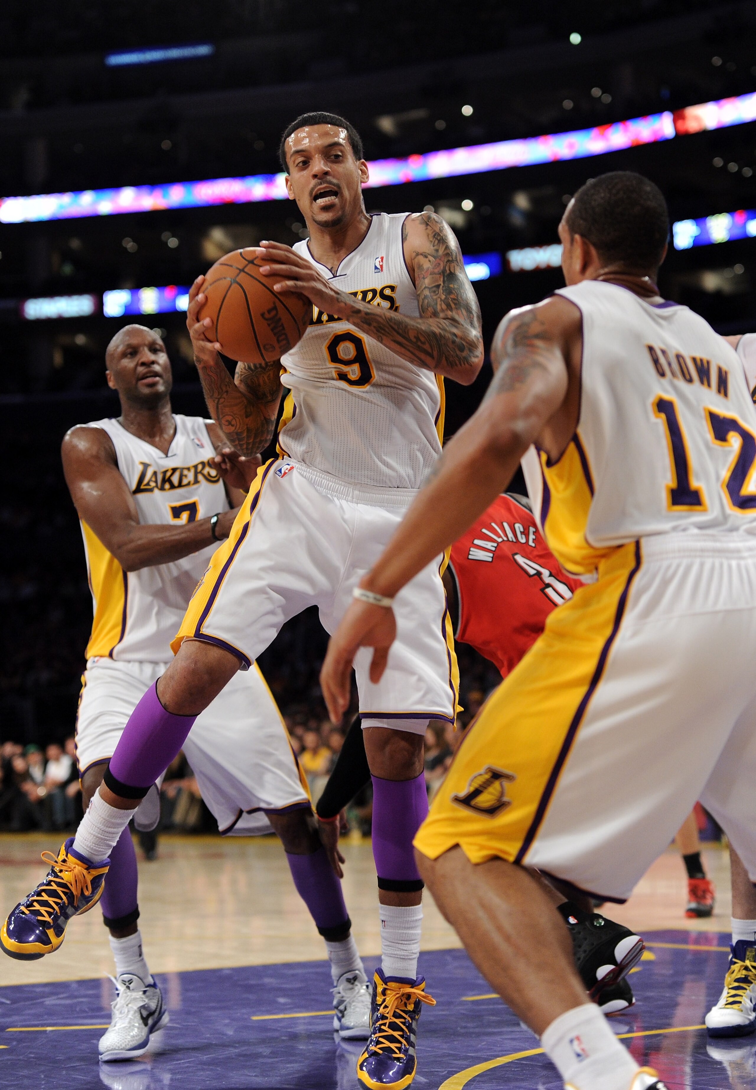 LOS ANGELES, CA - MARCH 20:  Matt Barnes #9 of the Los Angeles Lakers grabs a rebound during the game against the Portland Trail Blazers at the Staples Center on March 20, 2011 in Los Angeles, California.  NOTE TO USER: User expressly acknowledges and agr
