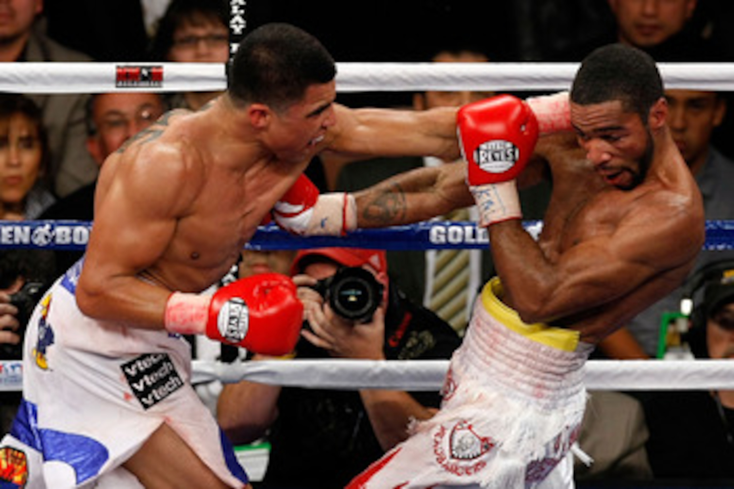 LAS VEGAS - DECEMBER 11:  (L-R) Victor Ortiz and Lamont Petersen exchange blows during the super lightweight fight at Mandalay Bay Events Center on December 11, 2010 in Las Vegas, Nevada.  (Photo by Ethan Miller/Getty Images)