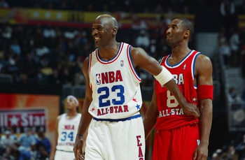 ATLANTA, GA - FEBRUARY 9:  Michael Jordan (Washington Wizards) #23 of the Eastern Conference All-Stars jokes with Kobe Bryant (Los Angeles Lakers) #8 of the Western Conference All-Stars during the 2003 NBA All-Star Game on February 9, 2003 at Philips Aren