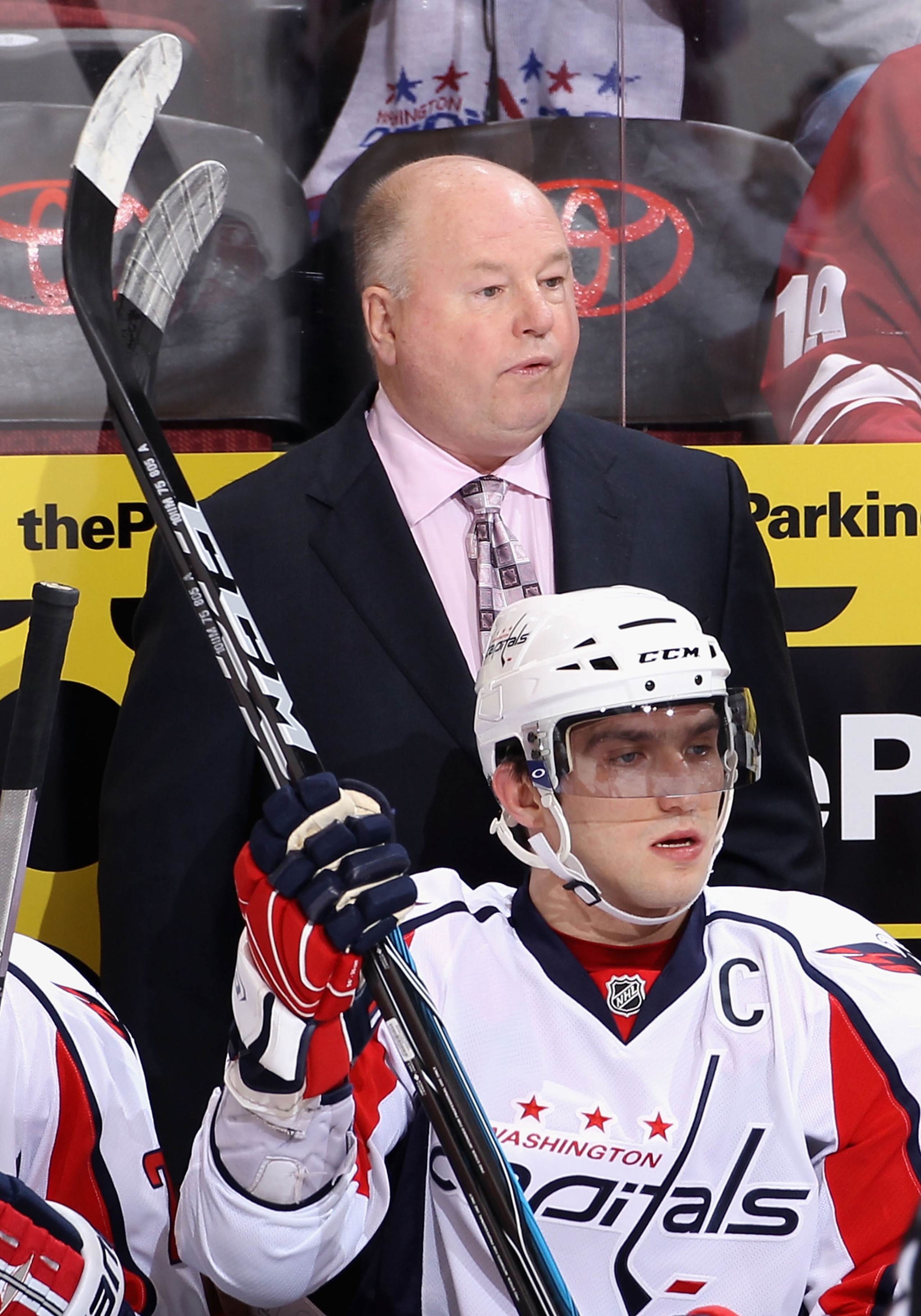 GLENDALE, AZ - FEBRUARY 14: Head coach Bruce Boudreau and Alex Ovechkin #8 of the Washington Capitals watch from the bench during the NHL game against the Phoenix Coyotes at Jobing.com Arena on February 14, 2011 in Glendale, Arizona. The Coyotes defeated GLENDALE, AZ - FEBRUARY 14: Head coach Bruce Boudreau and Alex Ovechkin #8 of the Washington Capitals watch from the bench during the NHL game against the Phoenix Coyotes at Jobing.com Arena on February 14, 2011 in Glendale, Arizona. The Coyotes defeated