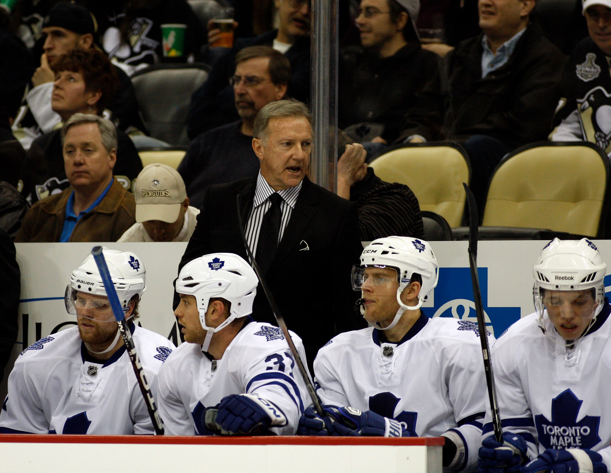 PITTSBURGH, PA - DECEMBER 08: Toronto Maple Leafs head coach Ron Wilson talks to his players against the Pittsburgh Penguins at Consol Energy Center on December 8, 2010 in Pittsburgh, Pennsylvania. Penguins defeated the Maple Leafs 5-2. (Photo by Justi PITTSBURGH, PA - DECEMBER 08: Toronto Maple Leafs head coach Ron Wilson talks to his players against the Pittsburgh Penguins at Consol Energy Center on December 8, 2010 in Pittsburgh, Pennsylvania. Penguins defeated the Maple Leafs 5-2. (Photo by Justi