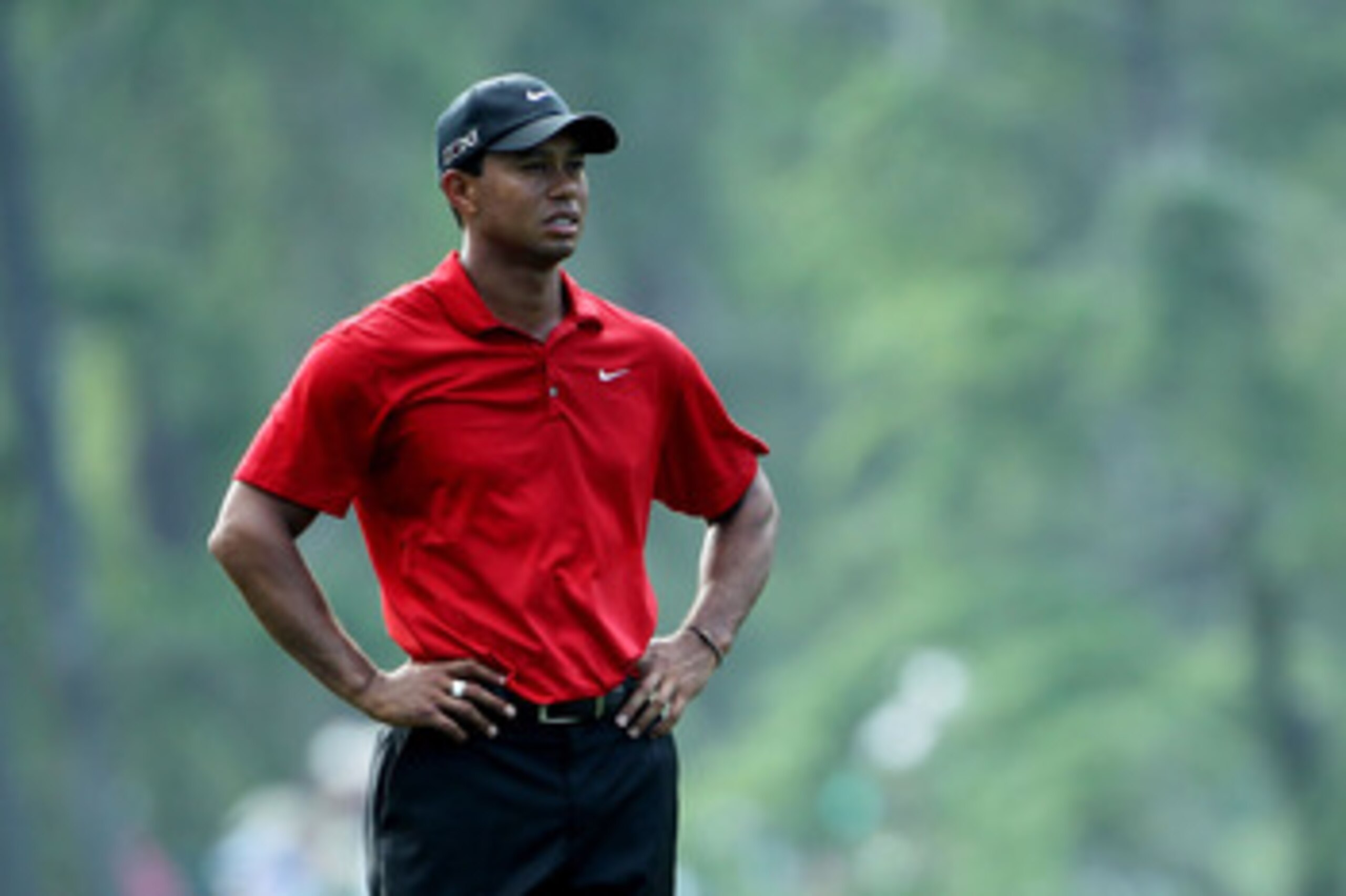 AUGUSTA, GA - APRIL 10:  Tiger Woods looks on during the final round of the 2011 Masters Tournament at Augusta National Golf Club on April 10, 2011 in Augusta, Georgia.  (Photo by Jamie Squire/Getty Images)