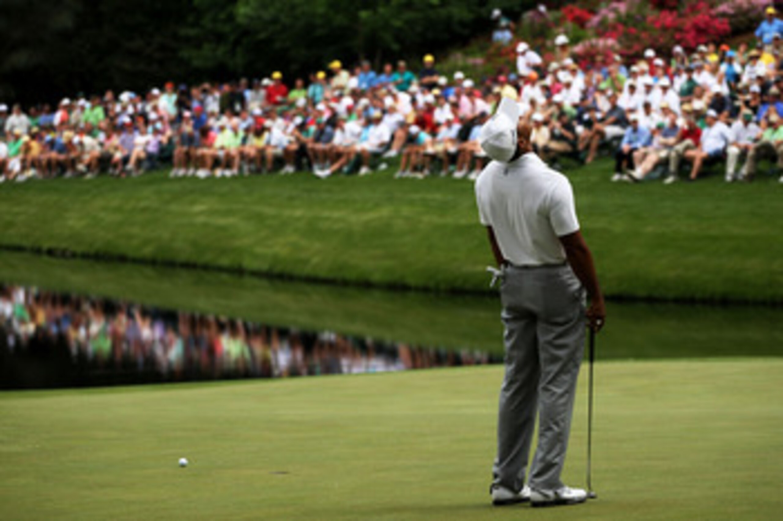 AUGUSTA, GA - APRIL 08:  Tiger Woods reacts to missing a putt on the 16th hole during the second round of the 2011 Masters Tournament at Augusta National Golf Club on April 8, 2011 in Augusta, Georgia.  (Photo by Jamie Squire/Getty Images)