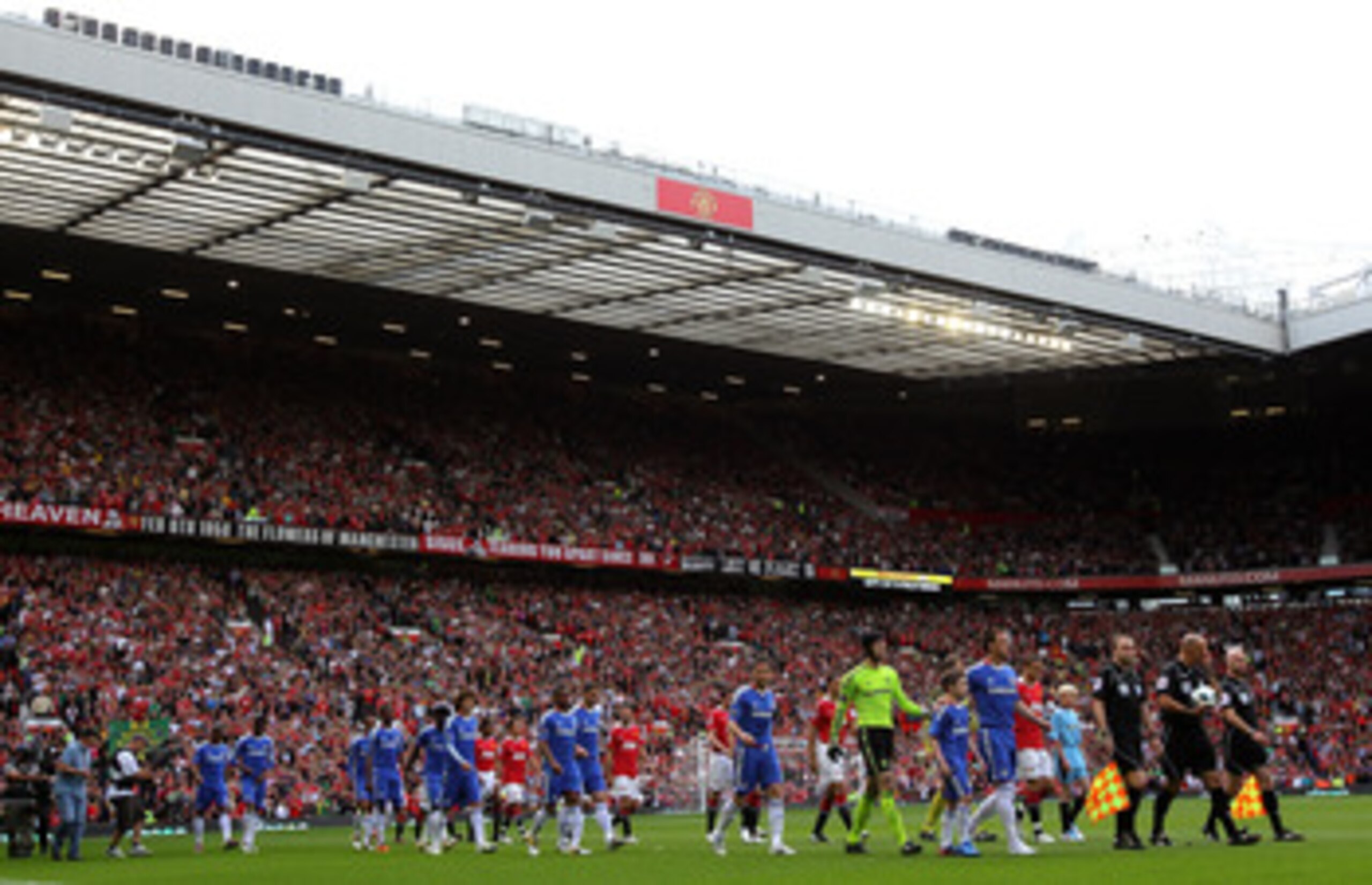 MANCHESTER, ENGLAND - MAY 08:  The Manchester United and Chelsea players walk out prior to the Barclays Premier League match between Manchester United and Chelsea at Old Trafford on May 8, 2011 in Manchester, England.  (Photo by Alex Livesey/Getty Images)
