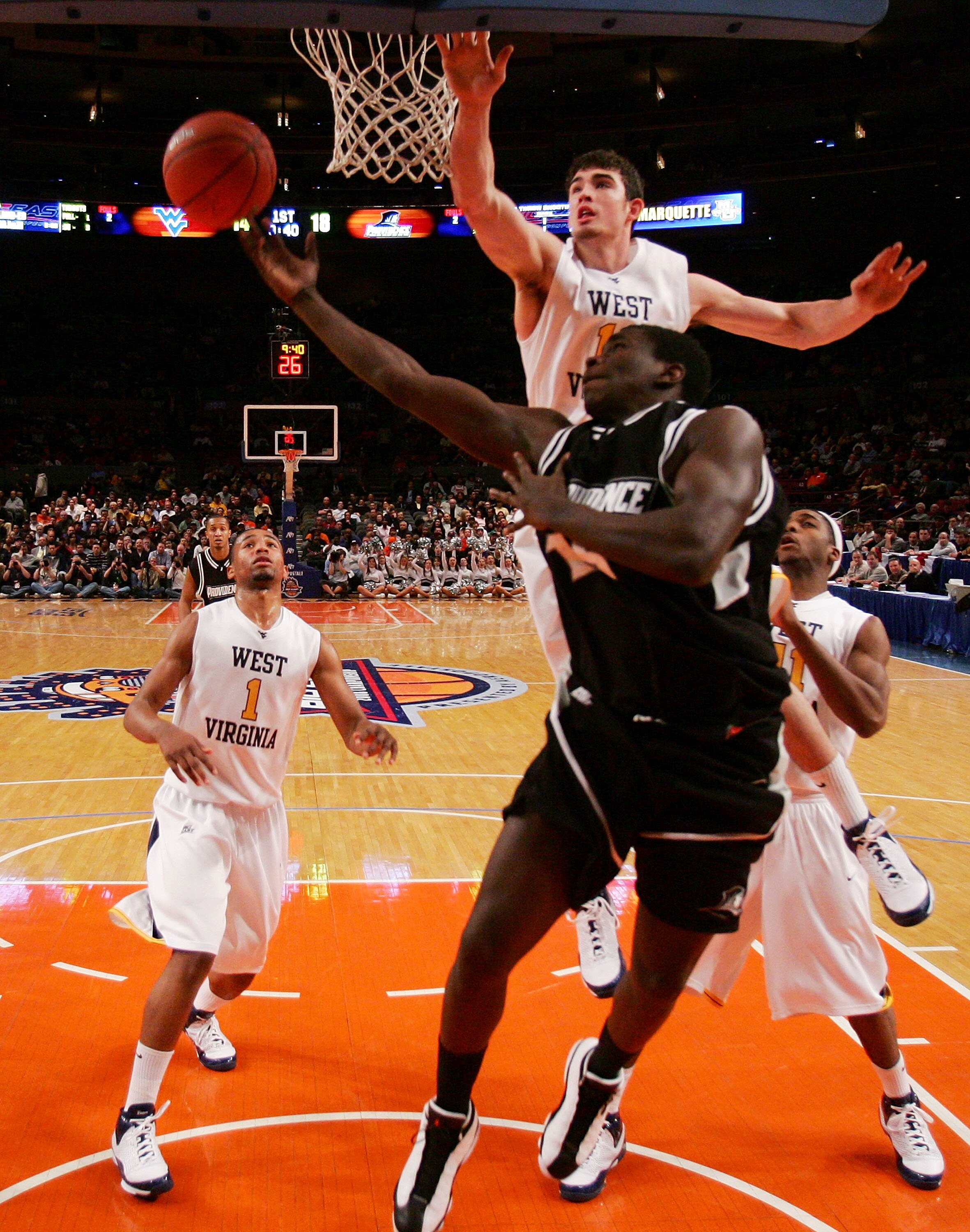NEW YORK - MARCH 12: Jamine Peterson #15 of the Providence Friars goes to the net against the West Virginia Mountaineers during the 2008 Big East Men's Basketball Championship at Madison Square Garden on March 12, 2008 in New York City.  (Photo by Jim McI