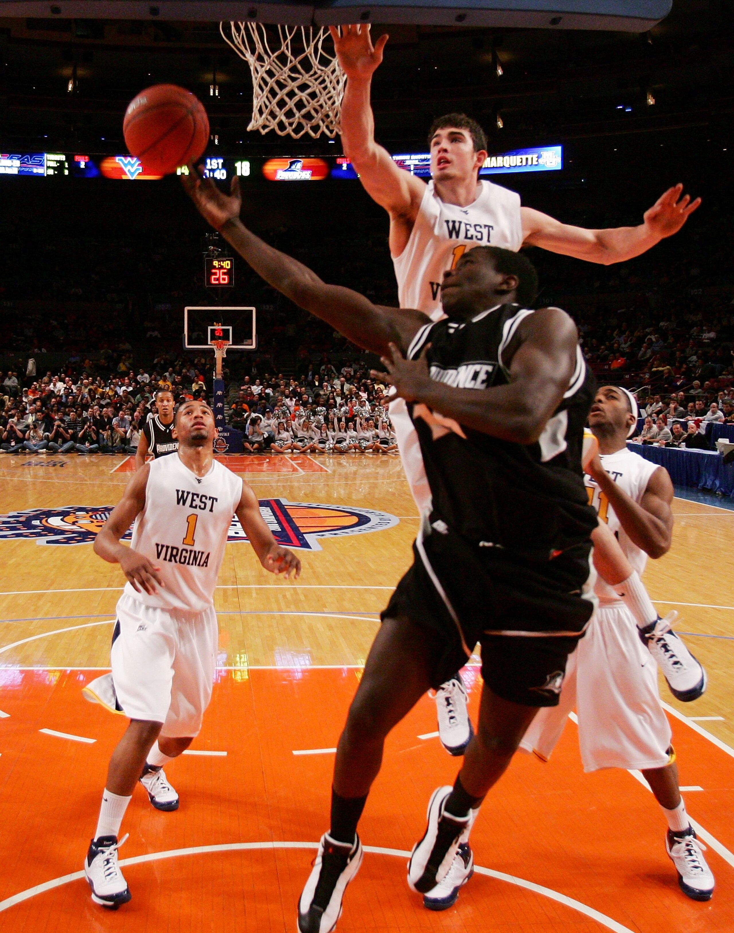NEW YORK - MARCH 12: Jamine Peterson #15 of the Providence Friars goes to the net against the West Virginia Mountaineers during the 2008 Big East Men's Basketball Championship at Madison Square Garden on March 12, 2008 in New York City.  (Photo by Jim McI