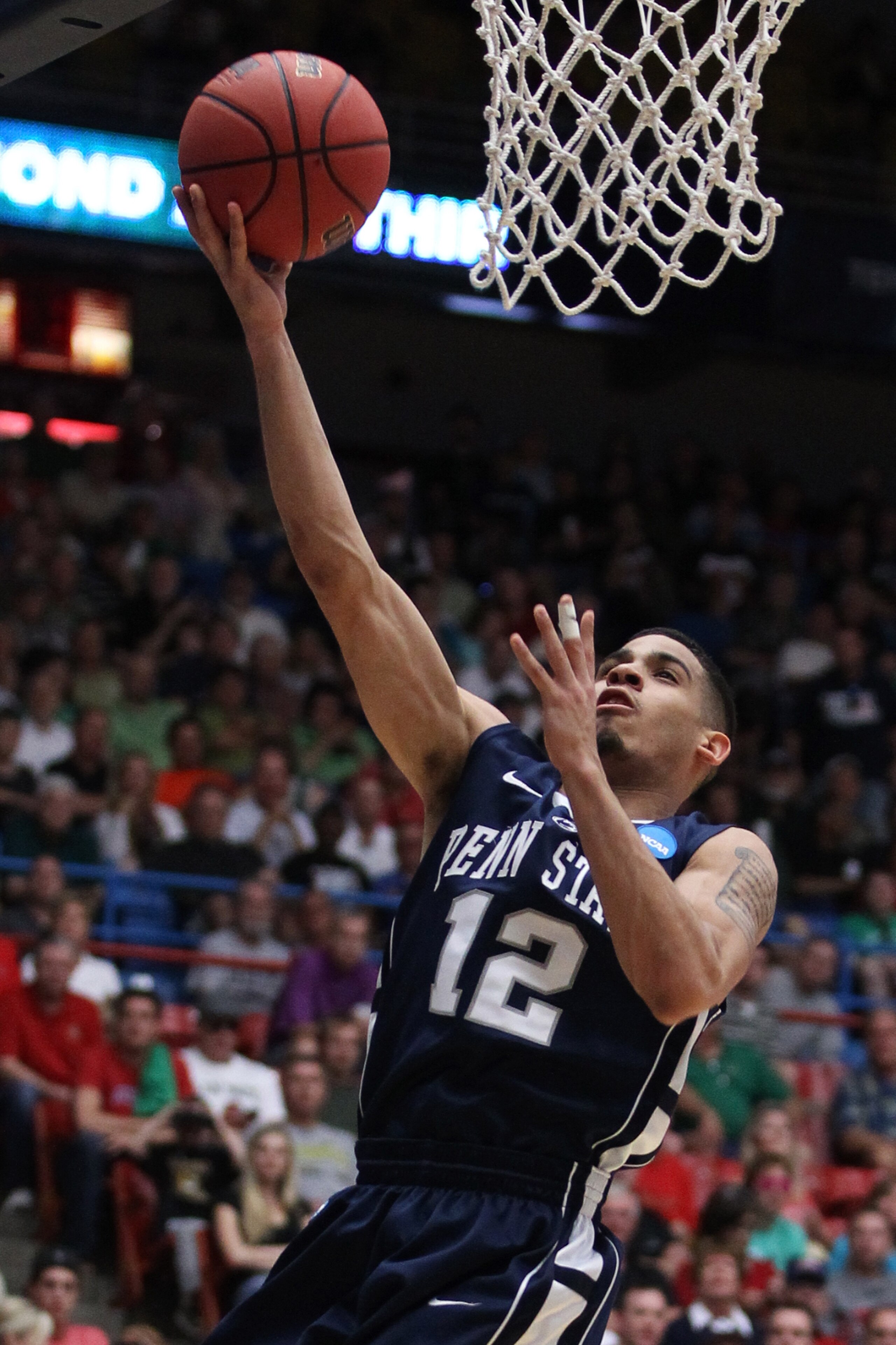 TUCSON, AZ - MARCH 17:  Talor Battle #12 of the Penn State Nittany Lions shoots against the Temple Owls during the second round of the 2011 NCAA men's basketball tournament at McKale Center on March 17, 2011 in Tucson, Arizona.  (Photo by Christian Peters