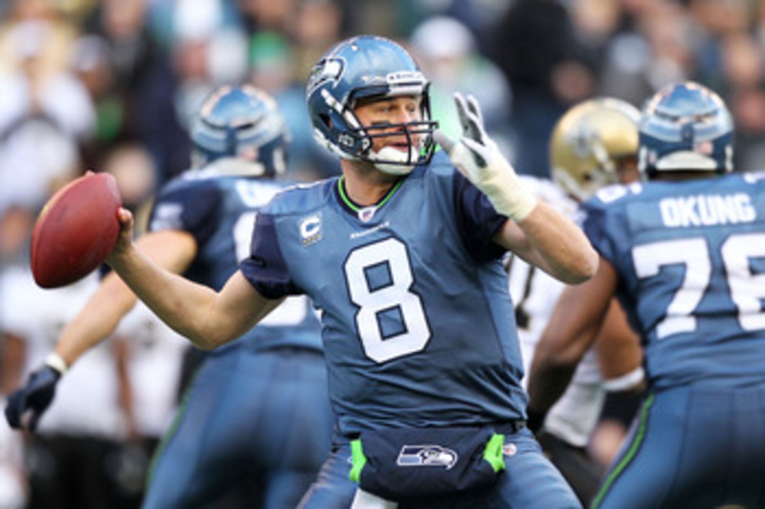 SEATTLE, WA - JANUARY 08:  Matt Hasselbeck #8 of the Seattle Seahawks scrambles against the New Orleans Saints during the 2011 NFC wild-card playoff game at Qwest Field on January 8, 2011 in Seattle, Washington.  (Photo by Otto Greule Jr/Getty Images)