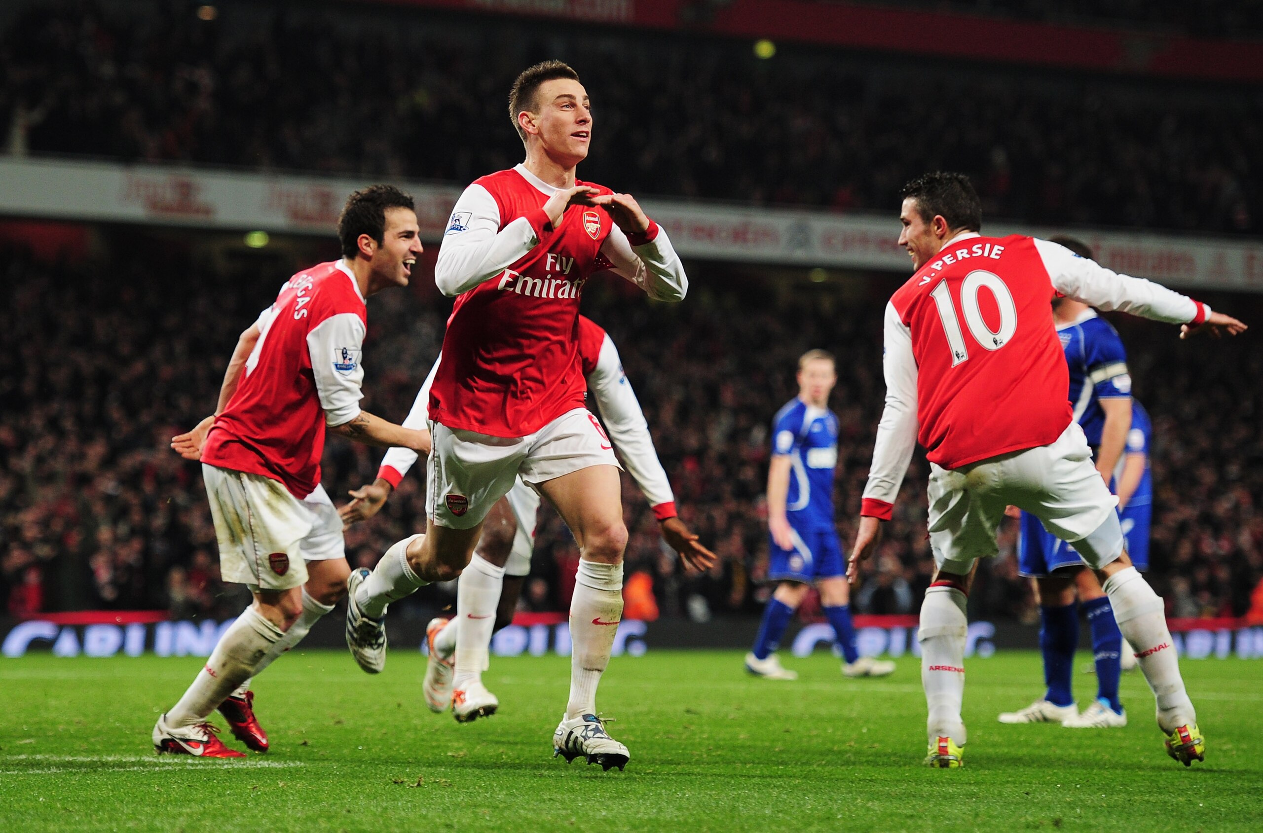 LONDON, ENGLAND - JANUARY 25:  Laurent Koscielny of Arsenal (2L) celebrates as he scores their second goal during the Carling Cup Semi Final Second Leg match between Arsenal and Ipswich Town at Emirates Stadium on January 25, 2011 in London, England.  (Ph