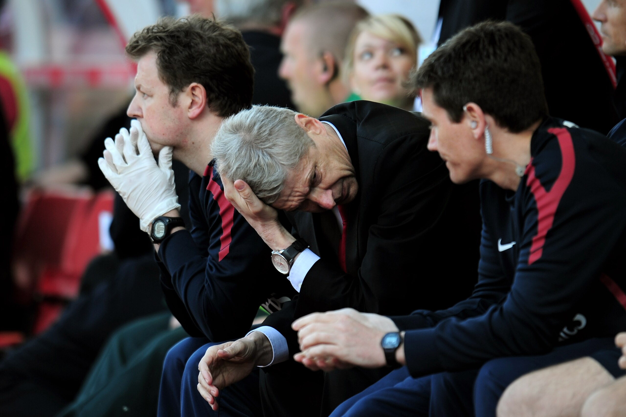 STOKE ON TRENT, ENGLAND - MAY 08:  A dejected Arsene Wenger the Arsenal manager holds his head in his hands as his team head towards a 3-1 defeat during the Barclays Premier League match between Stoke City and Arsenal at the Britannia Stadium on May 8, 20