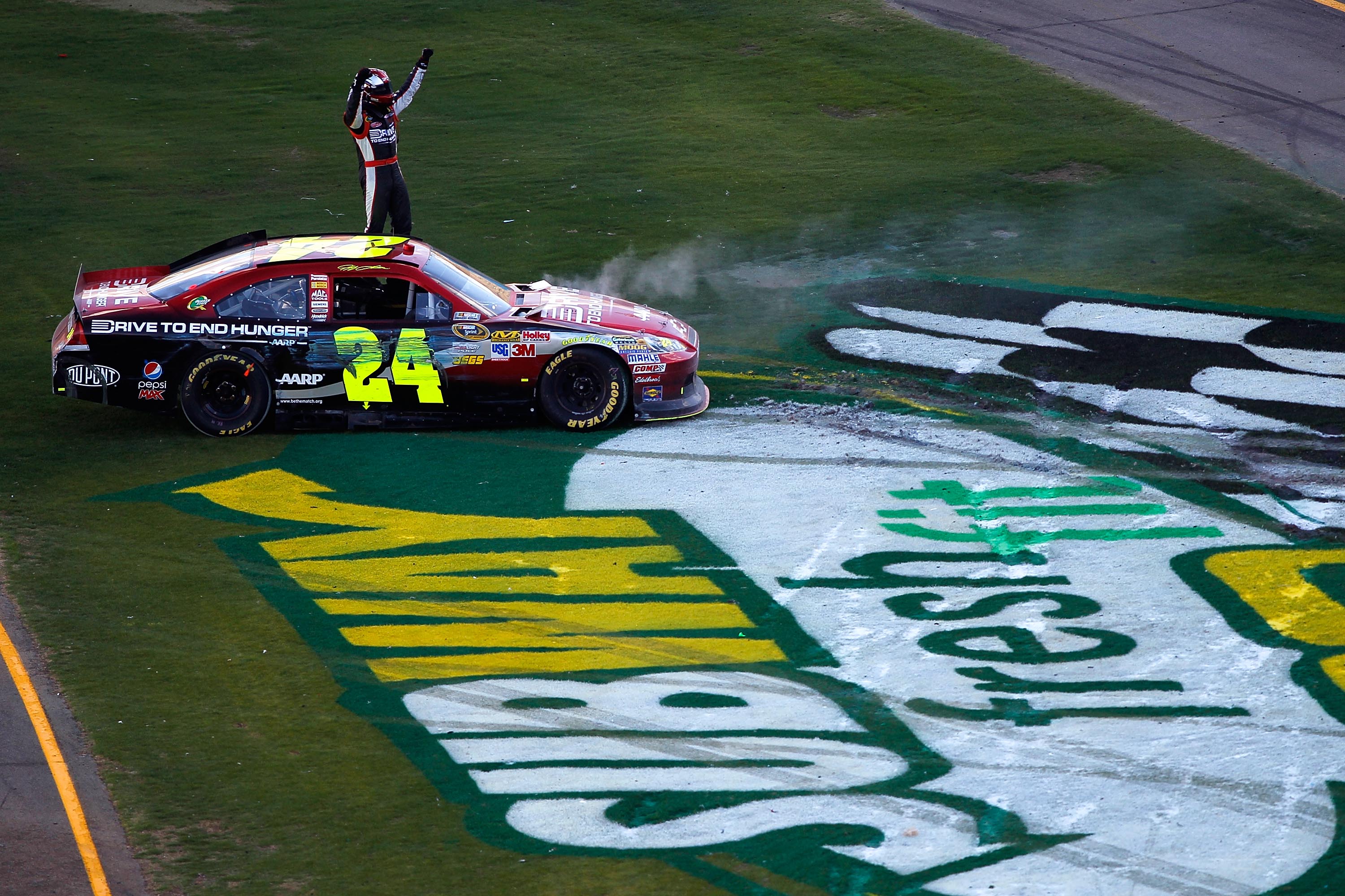 AVONDALE, AZ - FEBRUARY 27:  Jeff Gordon, driver of the #24 Drive To End Hunger Chevrolet, celebrates after winning the NASCAR Sprint Cup Series Subway Fresh Fit 500 at Phoenix International Raceway on February 27, 2011 in Avondale, Arizona.  (Photo by To