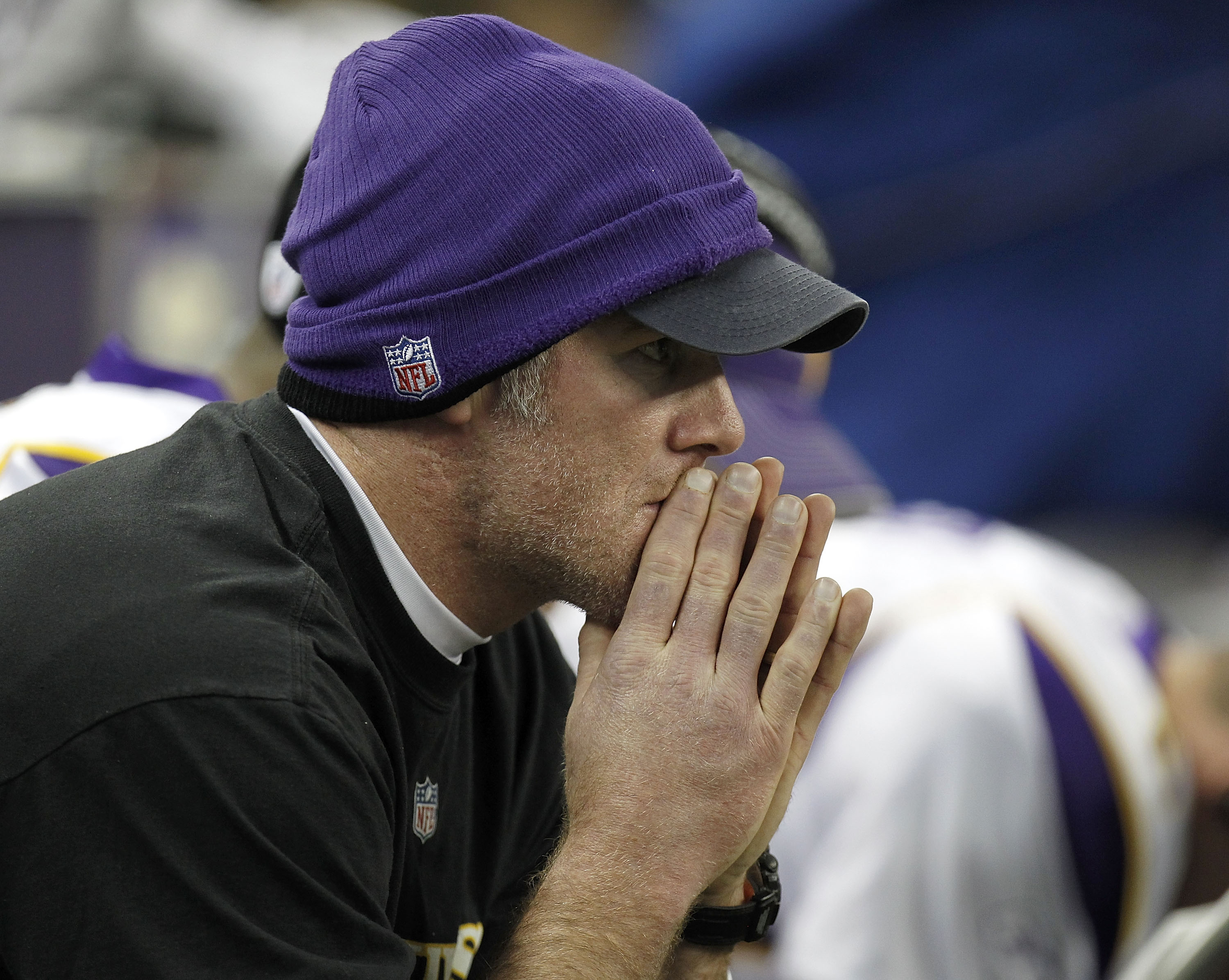 DETROIT, MI - JANUARY 02:  Brett Favre #4 of the Minnesota Vikings looks on from the bench while playing the Detroit Lions at Ford Field on January 2, 2011 in Detroit, Michigan.  (Photo by Gregory Shamus/Getty Images)