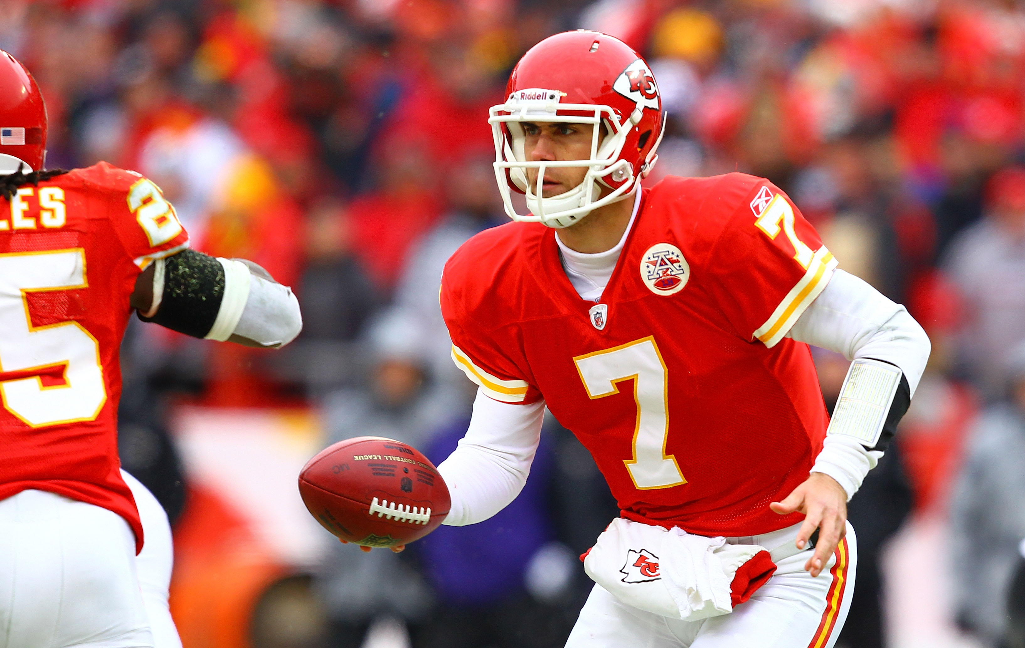 KANSAS CITY, MO - JANUARY 09:  Quarterback Matt Cassel #7 of the Kansas City Chiefs fakes a hand-offagainst the Baltimore Ravens in their 2011 AFC wild card playoff game at Arrowhead Stadium on January 9, 2011 in Kansas City, Missouri.  (Photo by Dilip Vi