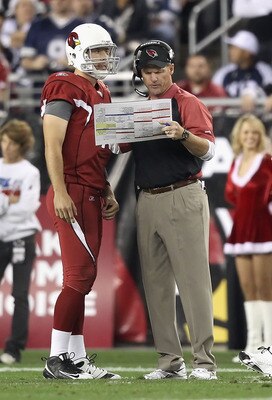GLENDALE, AZ - DECEMBER 25: Head coach Ken Whisenhunt of the Arizona Cardinals talks with quarterback John Skelton #19 during the NFL game against the Dallas Cowboys at the University of Phoenix Stadium on December 25, 2010 in Glendale, Arizona. The Card GLENDALE, AZ - DECEMBER 25: Head coach Ken Whisenhunt of the Arizona Cardinals talks with quarterback John Skelton #19 during the NFL game against the Dallas Cowboys at the University of Phoenix Stadium on December 25, 2010 in Glendale, Arizona. The Card