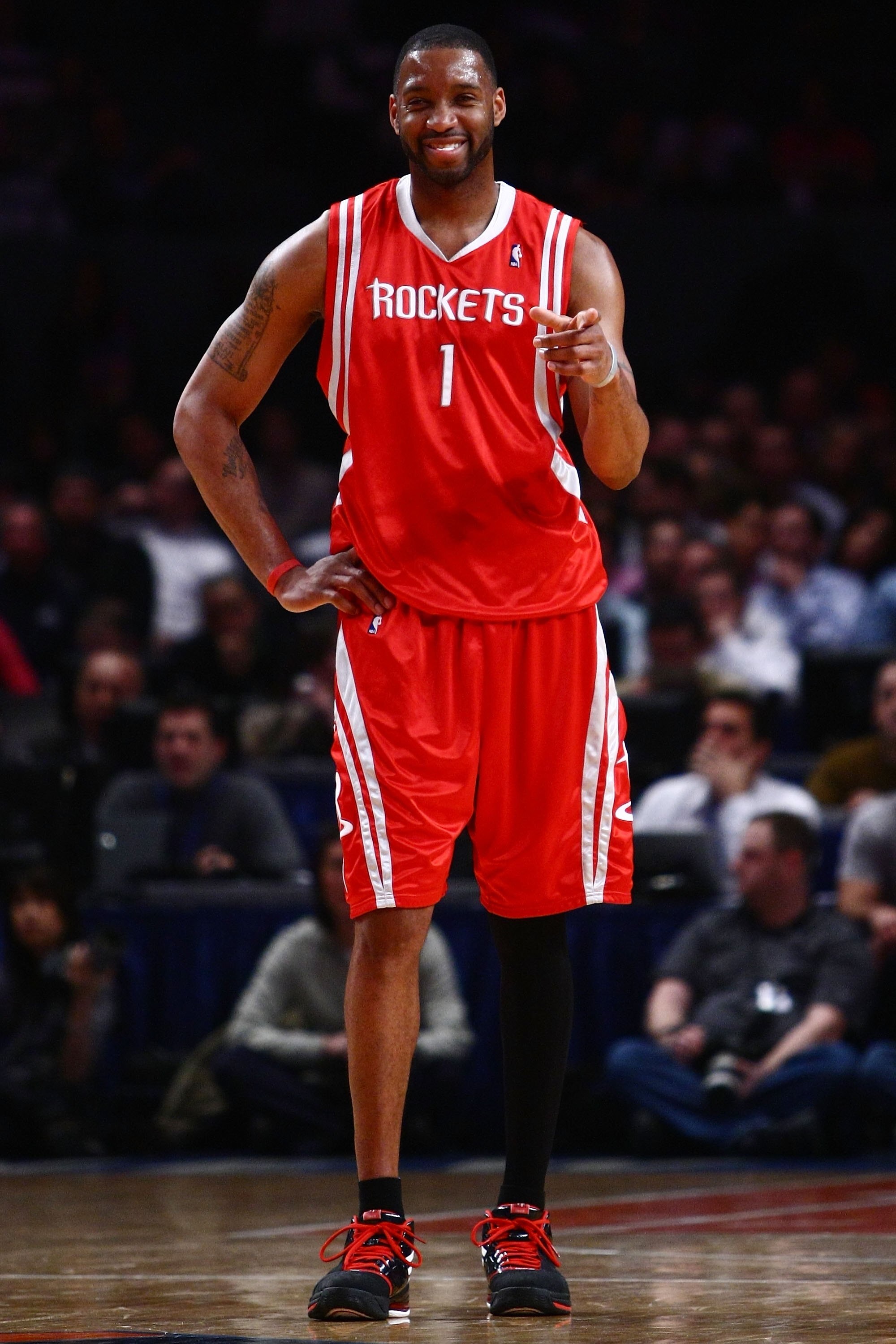 NEW YORK - JANUARY 26:  Tracy McGrady #1 of the Houston Rockets smiles against the New York Knicks on January 26, 2009 at Madison Square Garden in New York City.  NOTE TO USER: User expressly acknowledges and agrees that, by downloading and/or using this 