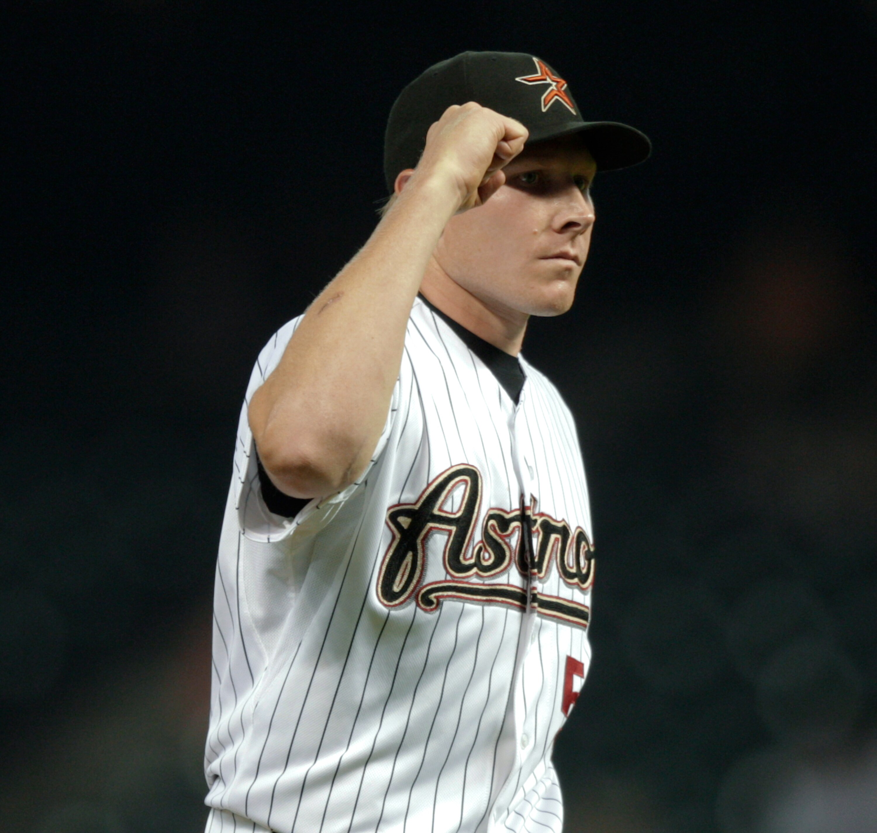 HOUSTON - APRIL 14:  Pitcher Mark Melancon #54 of the Houston Astros pumps his fist after getting out of jam in the eightg inning against the San Diego Padres at Minute Maid Park on April 14, 2011 in Houston, Texas.  (Photo by Bob Levey/Getty Images)
