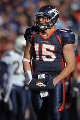 DENVER - JANUARY 02:  Quarterback Tim Tebow #15 of the Denver Broncos looks on against the San Diego Chargers at INVESCO Field at Mile High on January 2, 2011 in Denver, Colorado.  (Photo by Doug Pensinger/Getty Images)